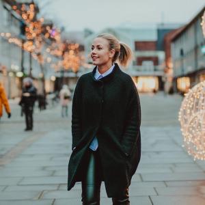 Veronica Kåring walking Christmas street, Bodø, Northern Norway