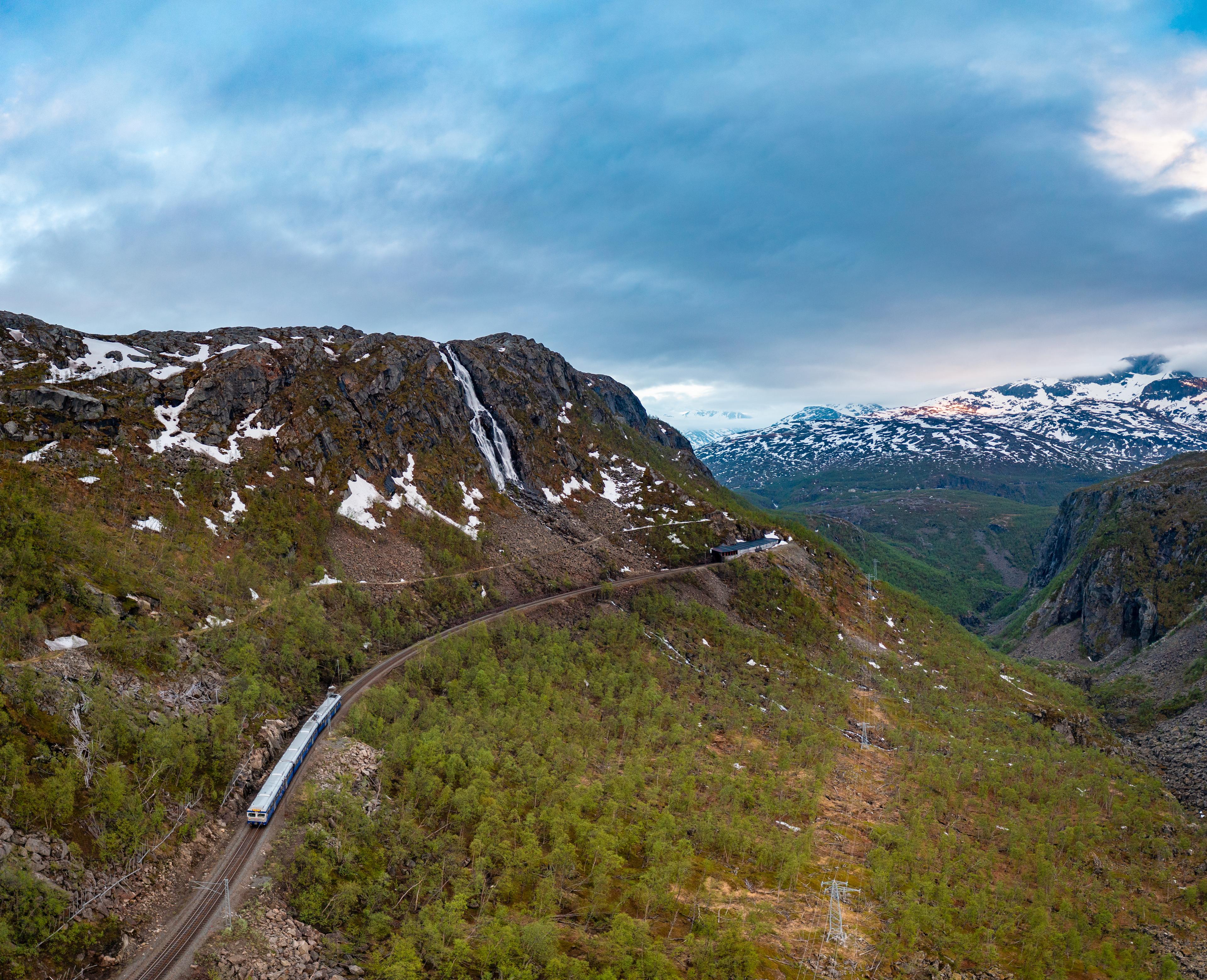 A train on a mountainside in Norway