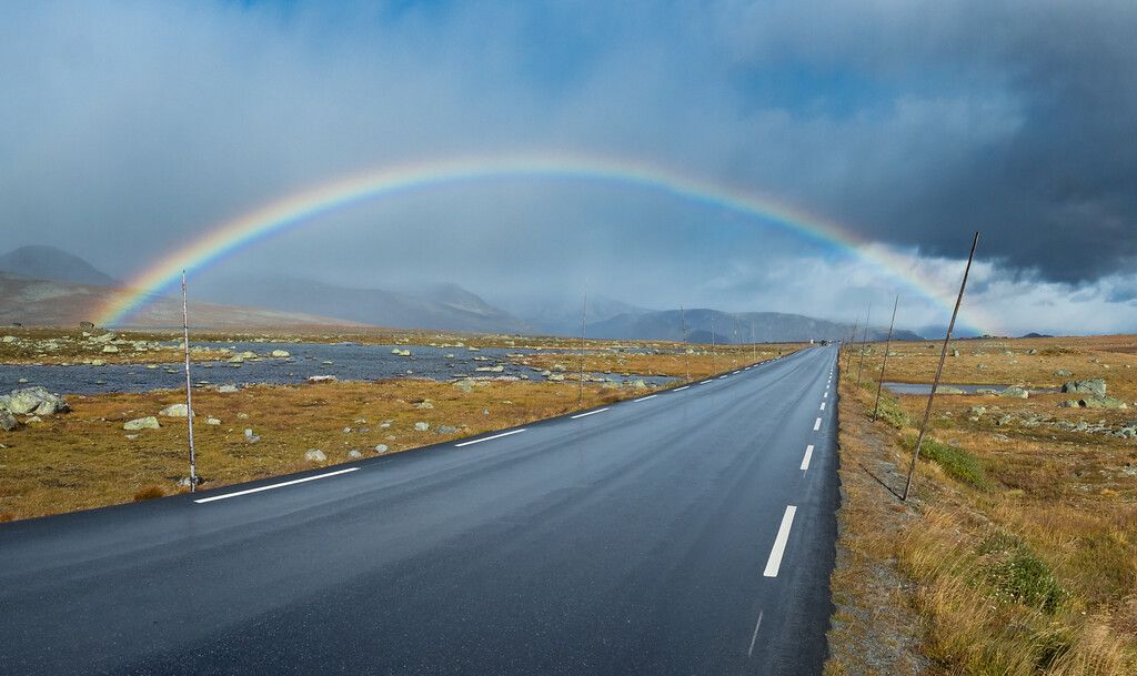 Rainbow over Norwegian Scenic Route Valdresflye in Eastern Norway