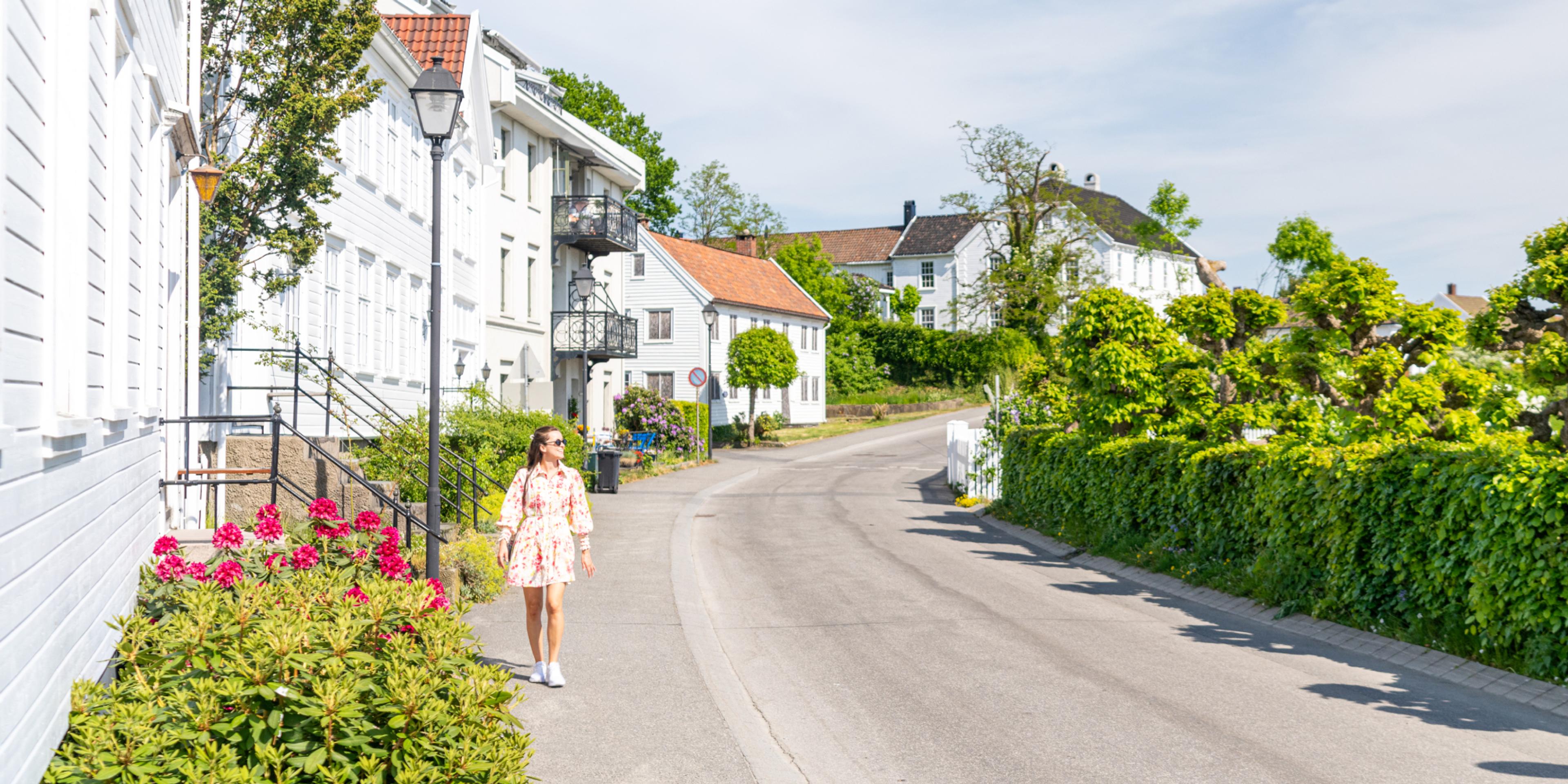 Woman walking in Lillesand, Southern Norway