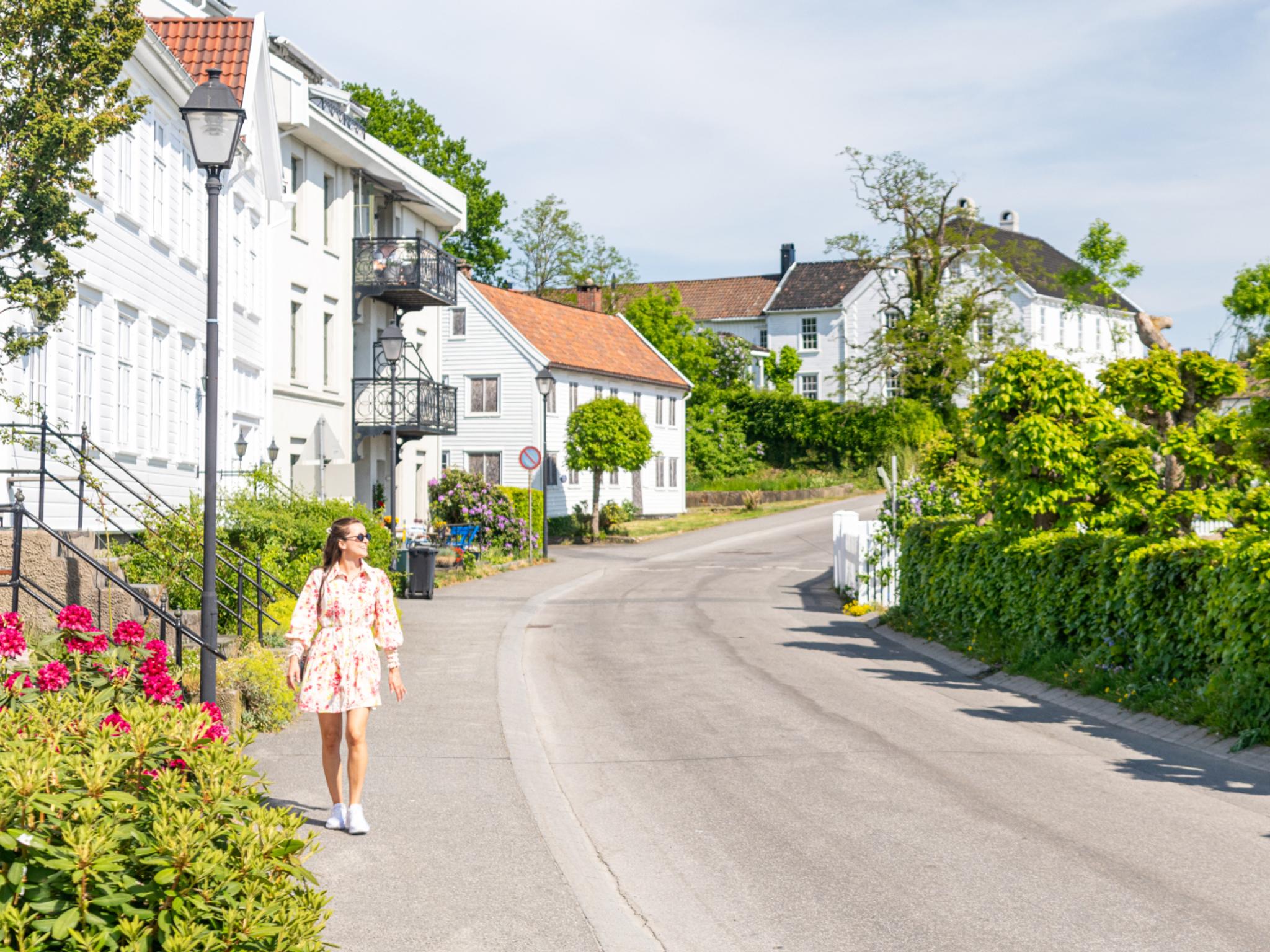 Woman walking in Lillesand, Southern Norway