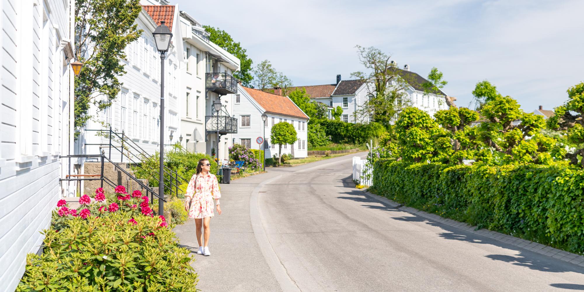 Woman walking in Lillesand, Southern Norway
