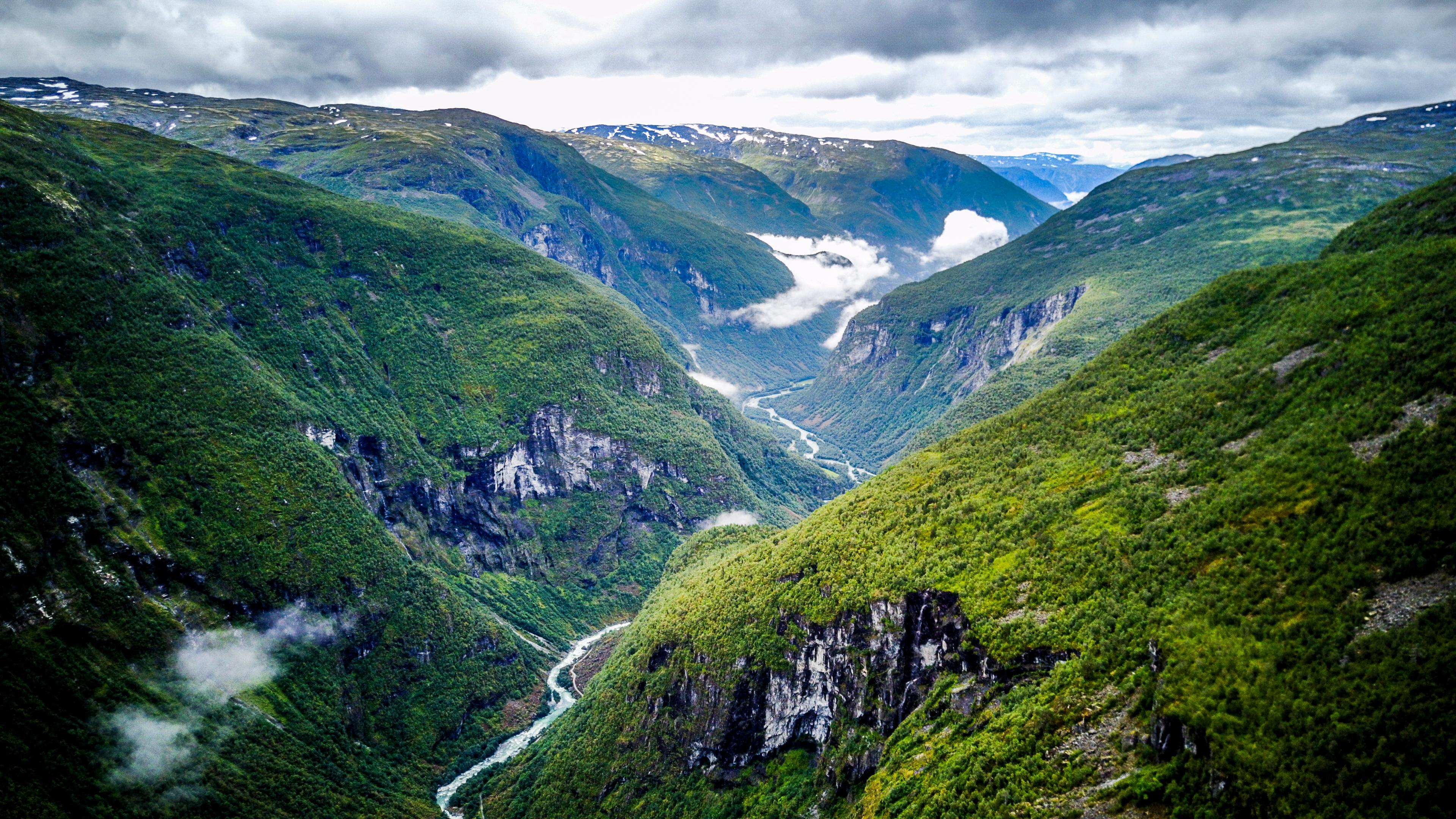 Utladalen valley with green hills and a river