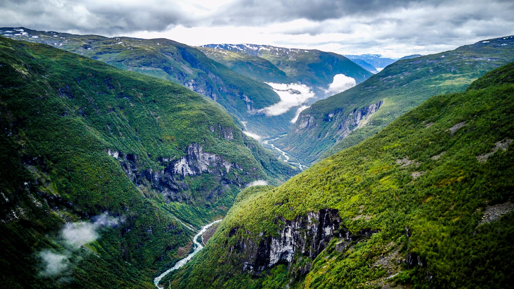 Utladalen valley with green hills and a river