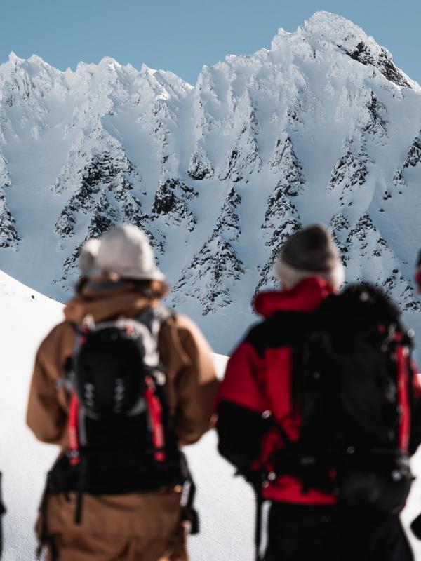 A group of people ski touring to Smørskredtindane in Ørsta and Stranda at Sunnmøre in Fjord Norway