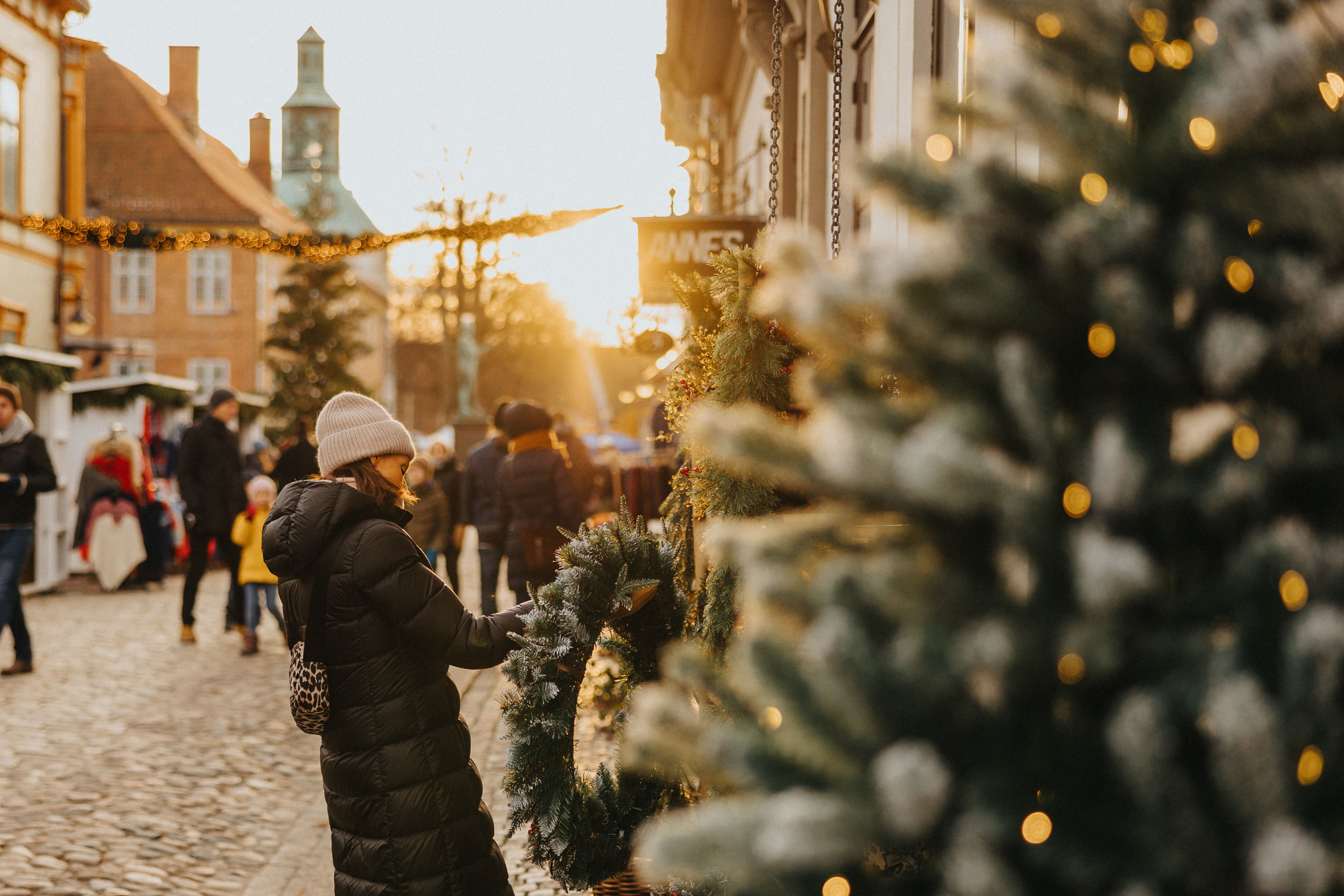 A woman attending Christmas in the old town, Gamlebyen, in Fredrikstad