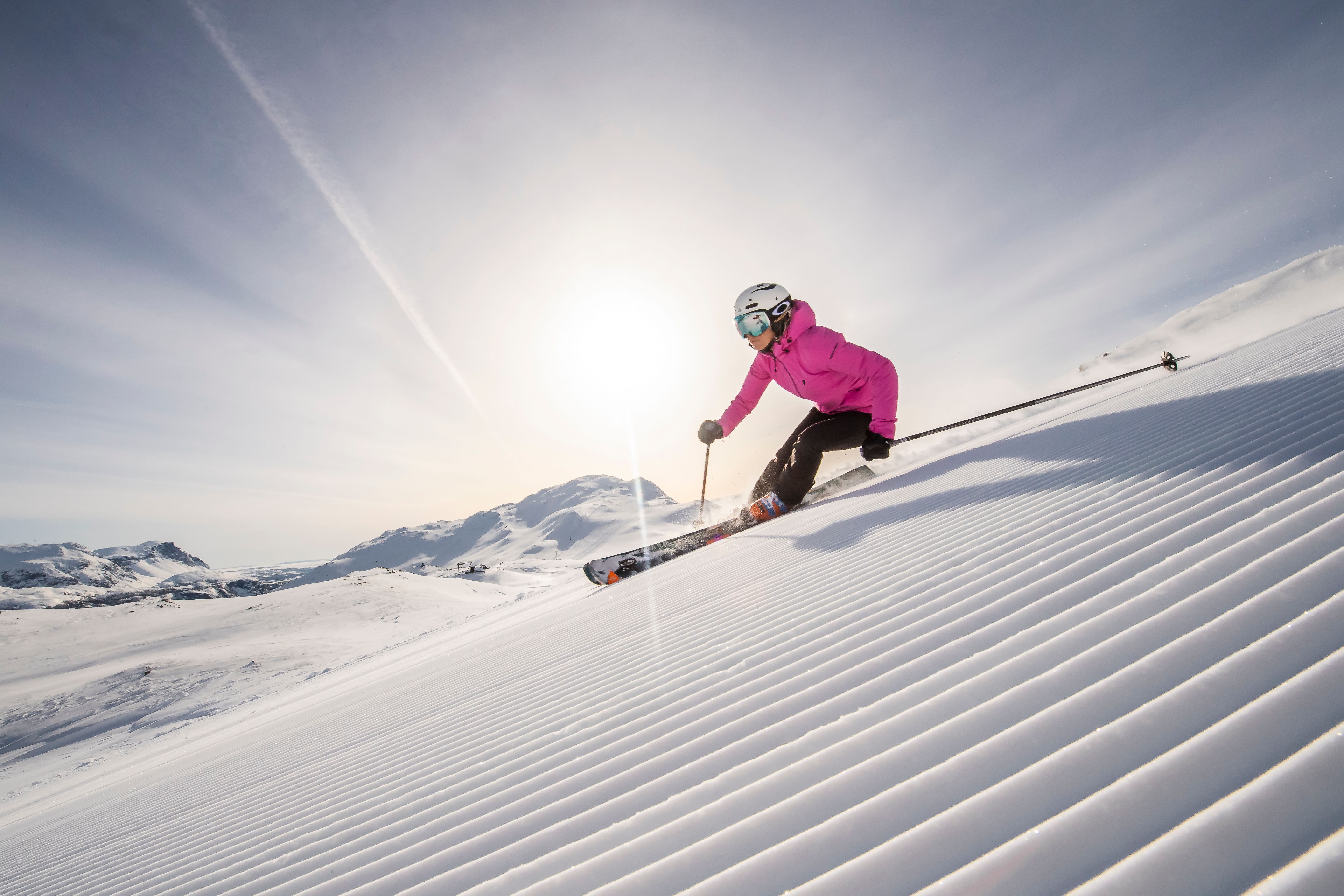 A woman skiing down an alpine slope in Hemsedal in Eastern Norway