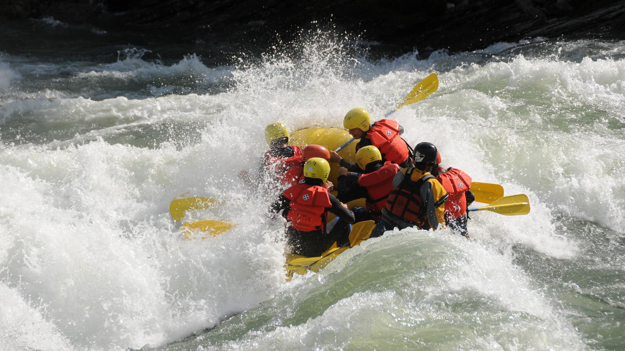 A group of people rafting in the Sjoa river in Eastern Norway