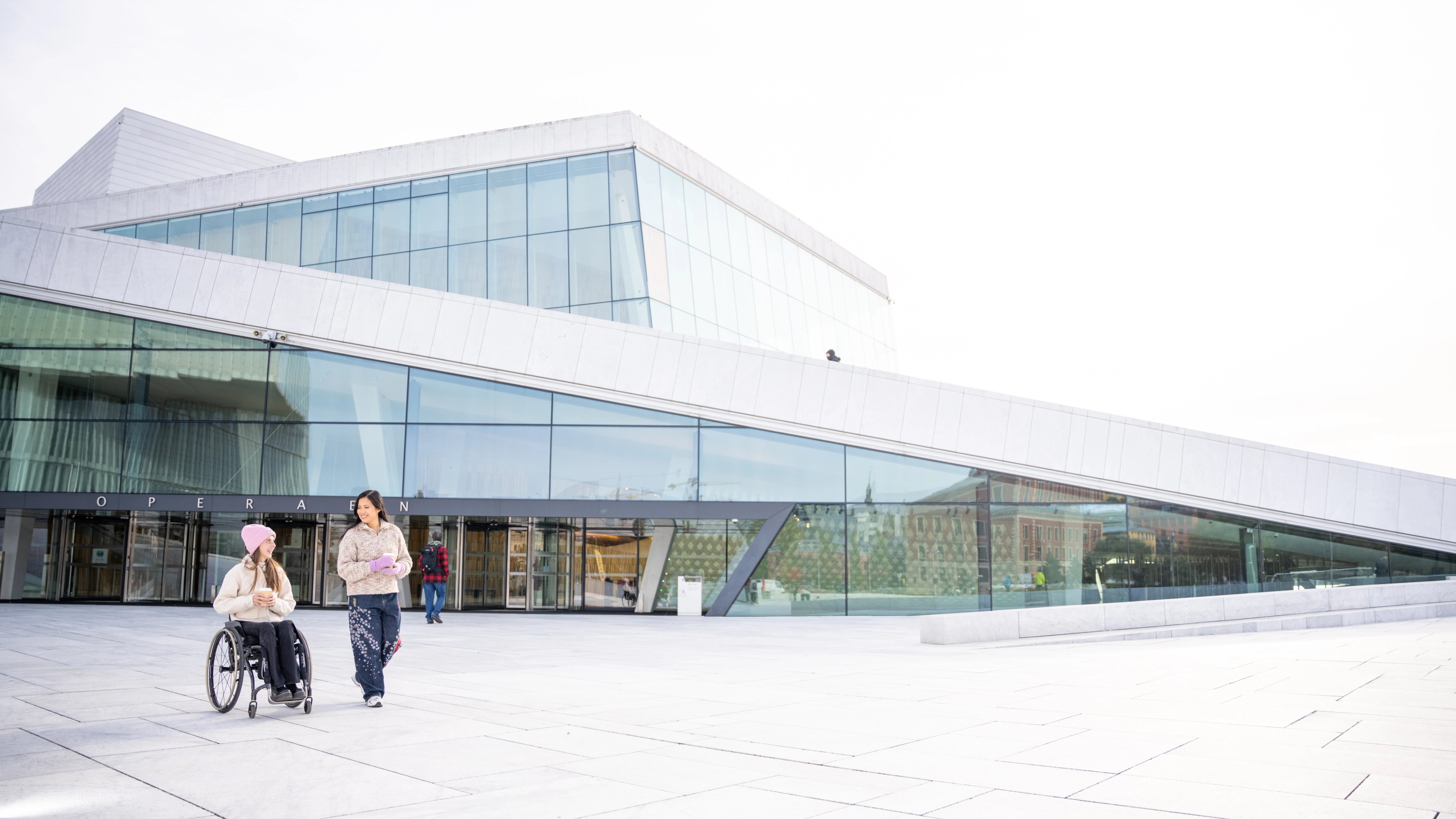 Two women outside of the Opera house in Oslo