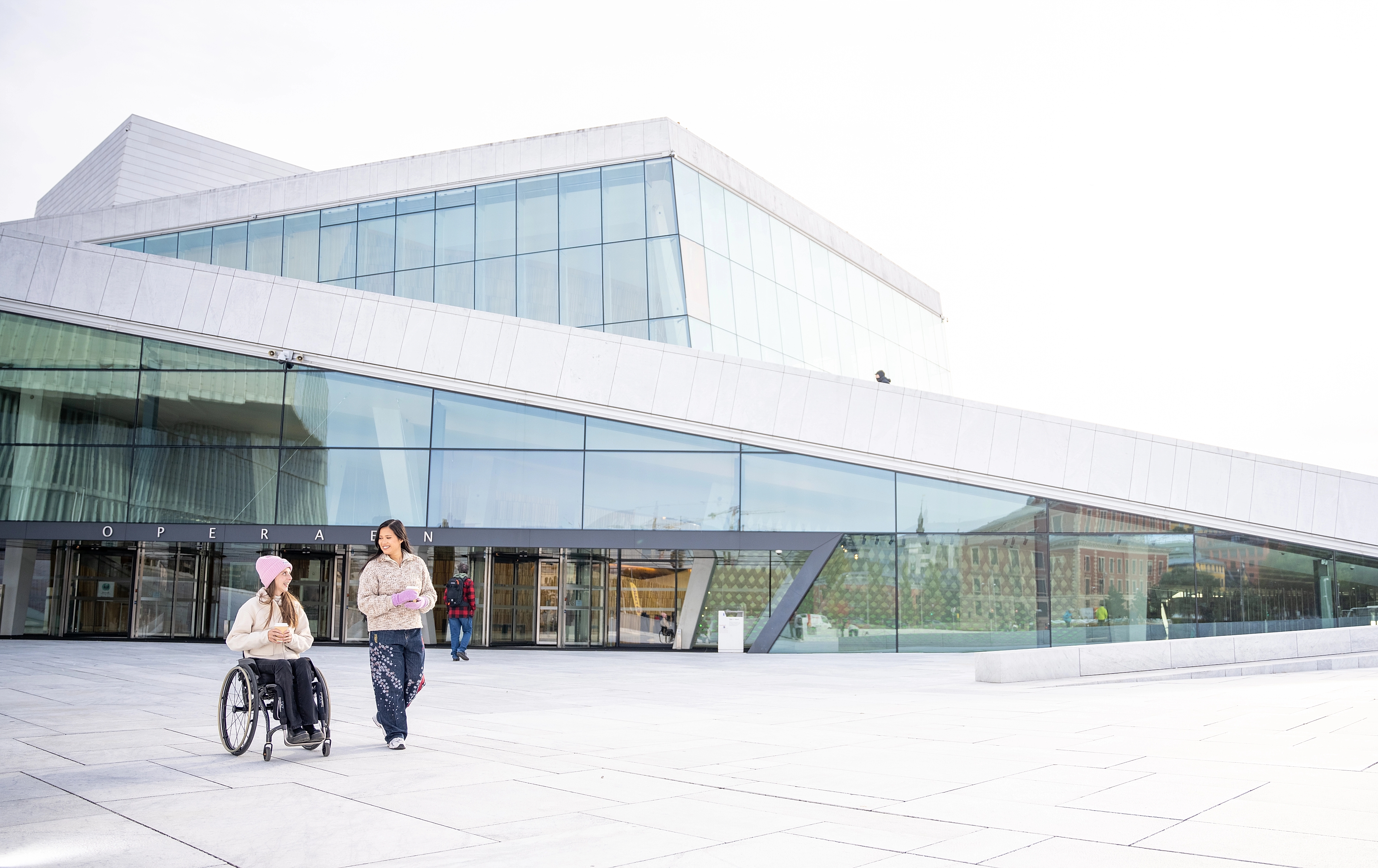 Two women outside of the Opera house in Oslo