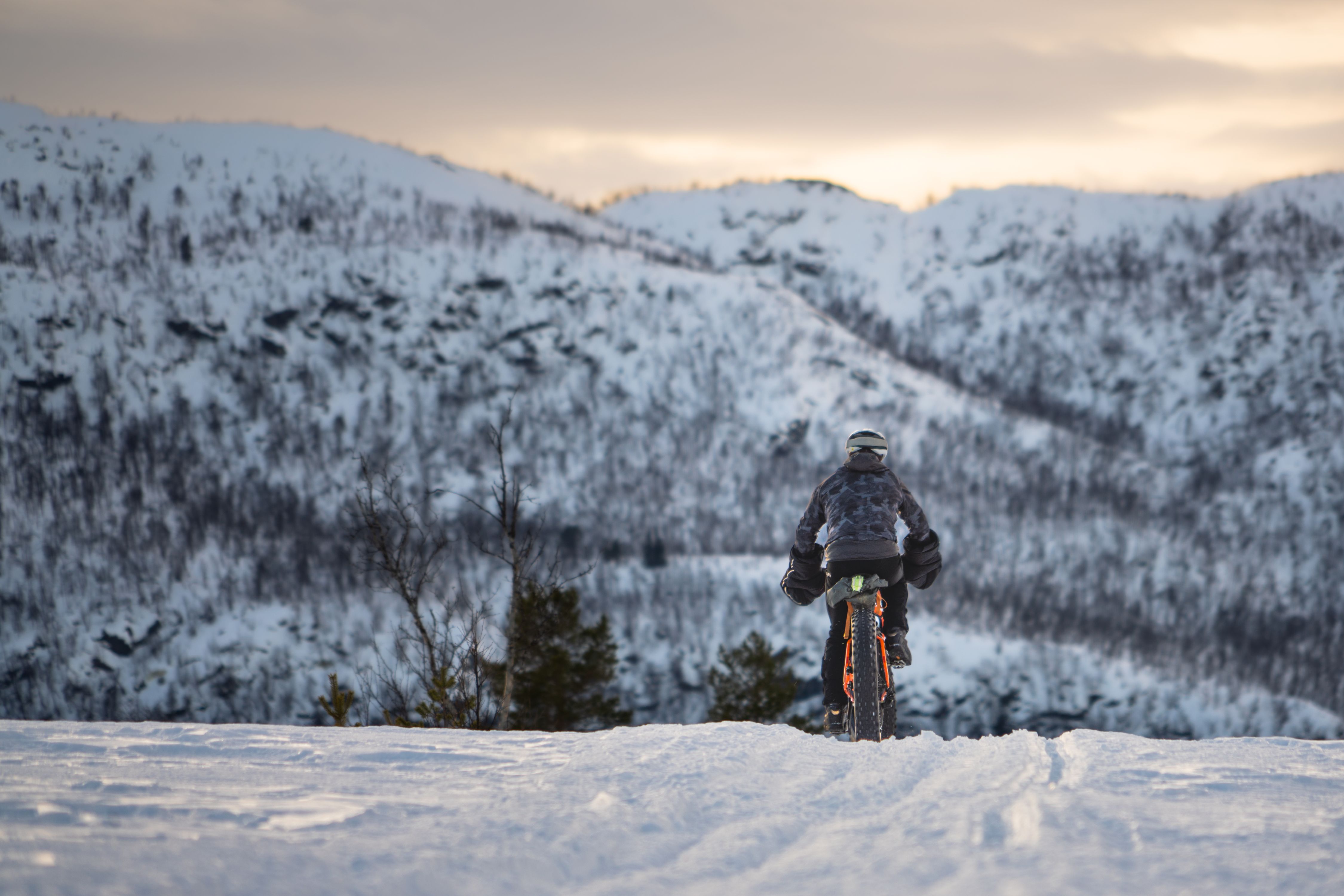 A woman on a fatbike in winter at Geilo, Norway.