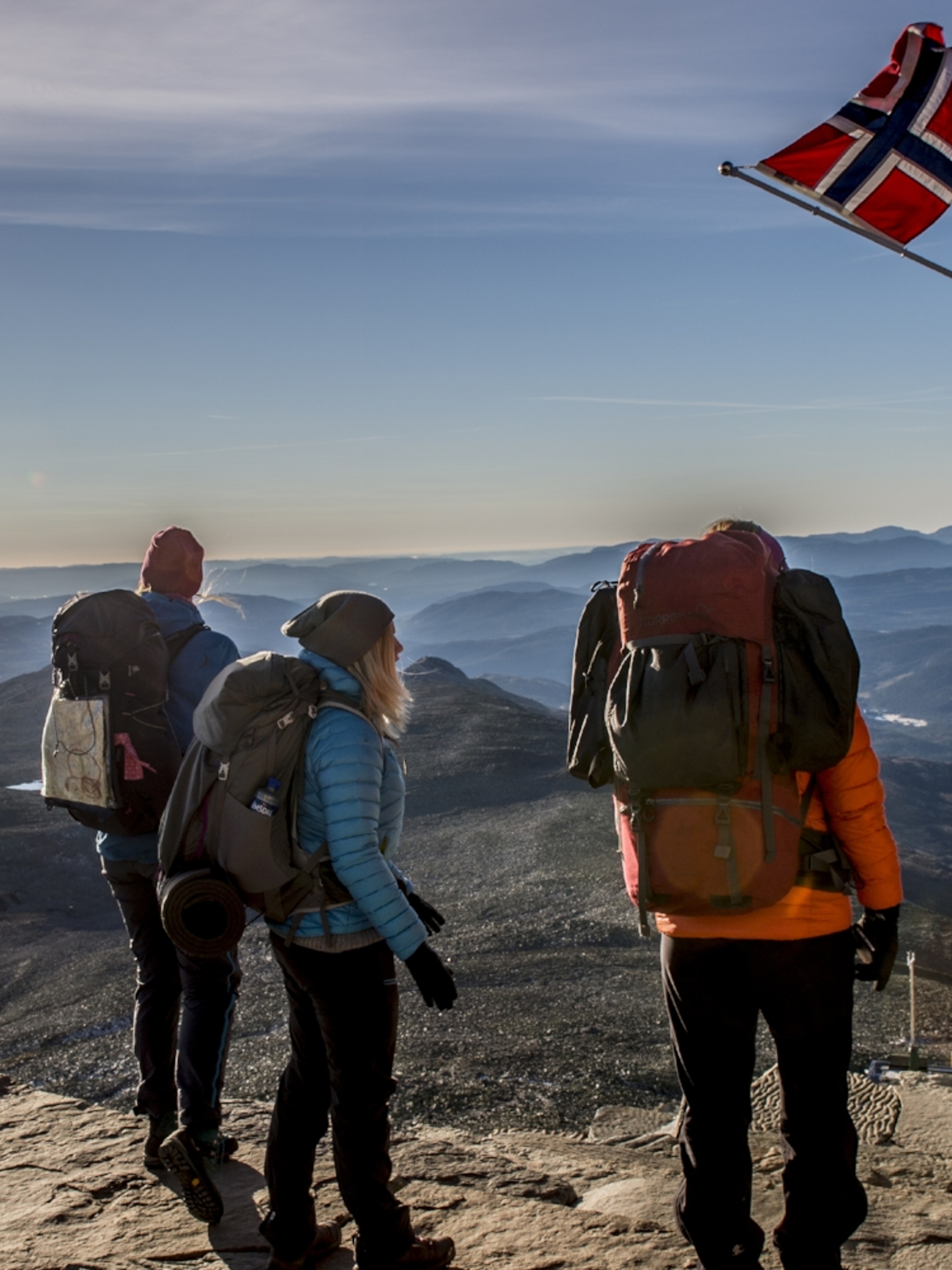 People standing at the top of Mount Gaustatoppen near Rjukan in Telemark, Eastern Norway