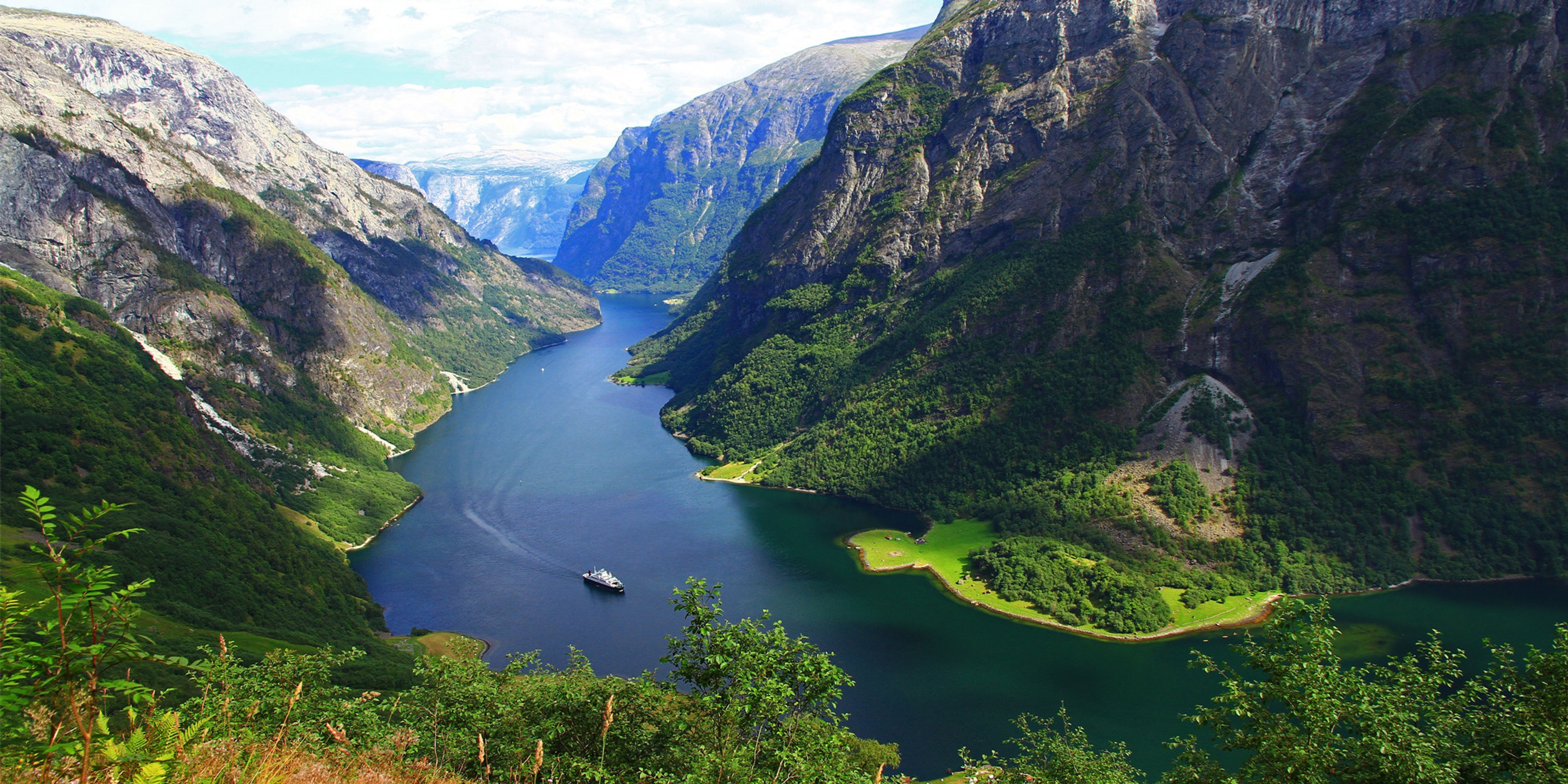 The Nærøyfjord in Fjord Norway on a sunny summer day