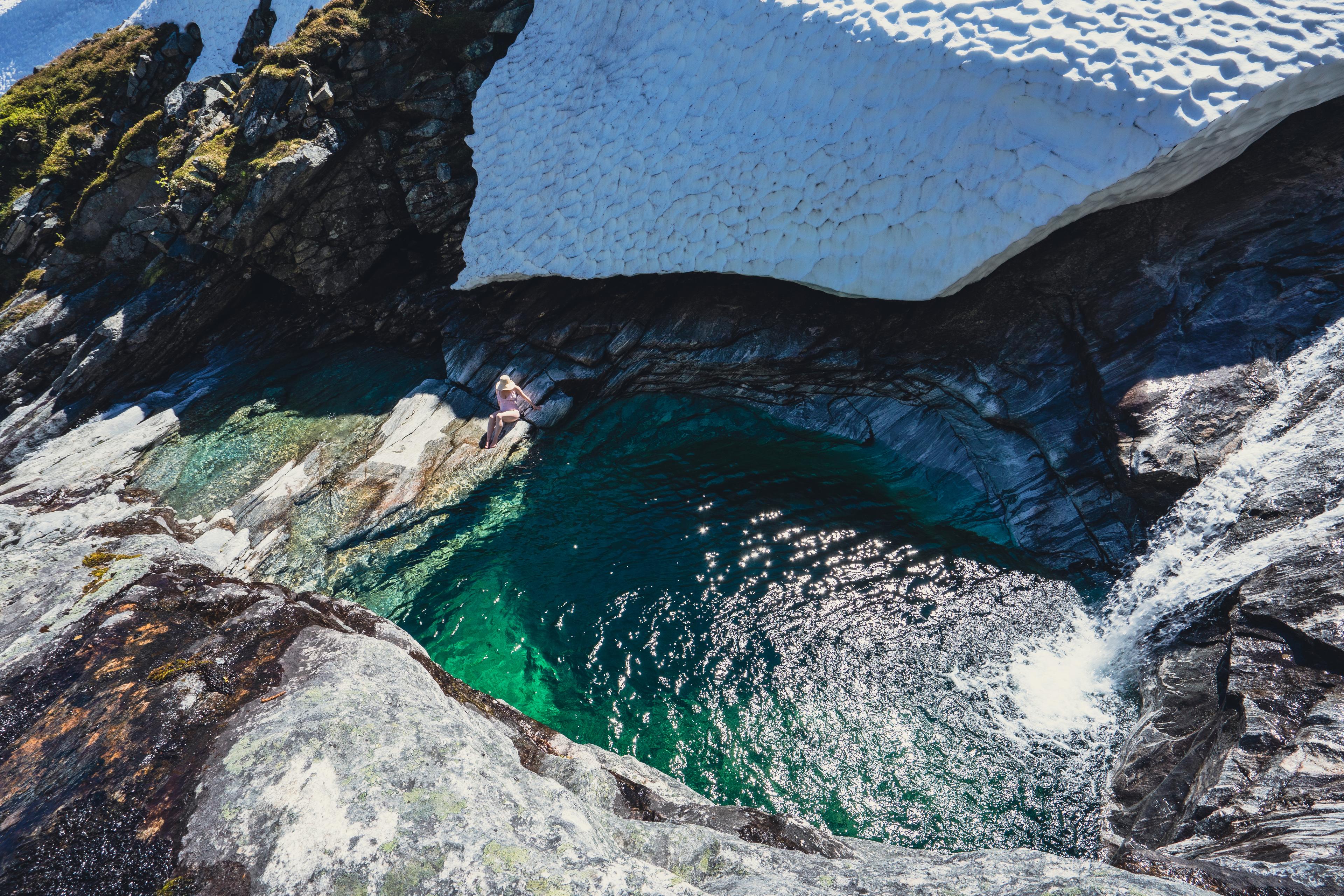 Woman ready for a swim in a pothole in Finnsetlia, Aursjøvegen