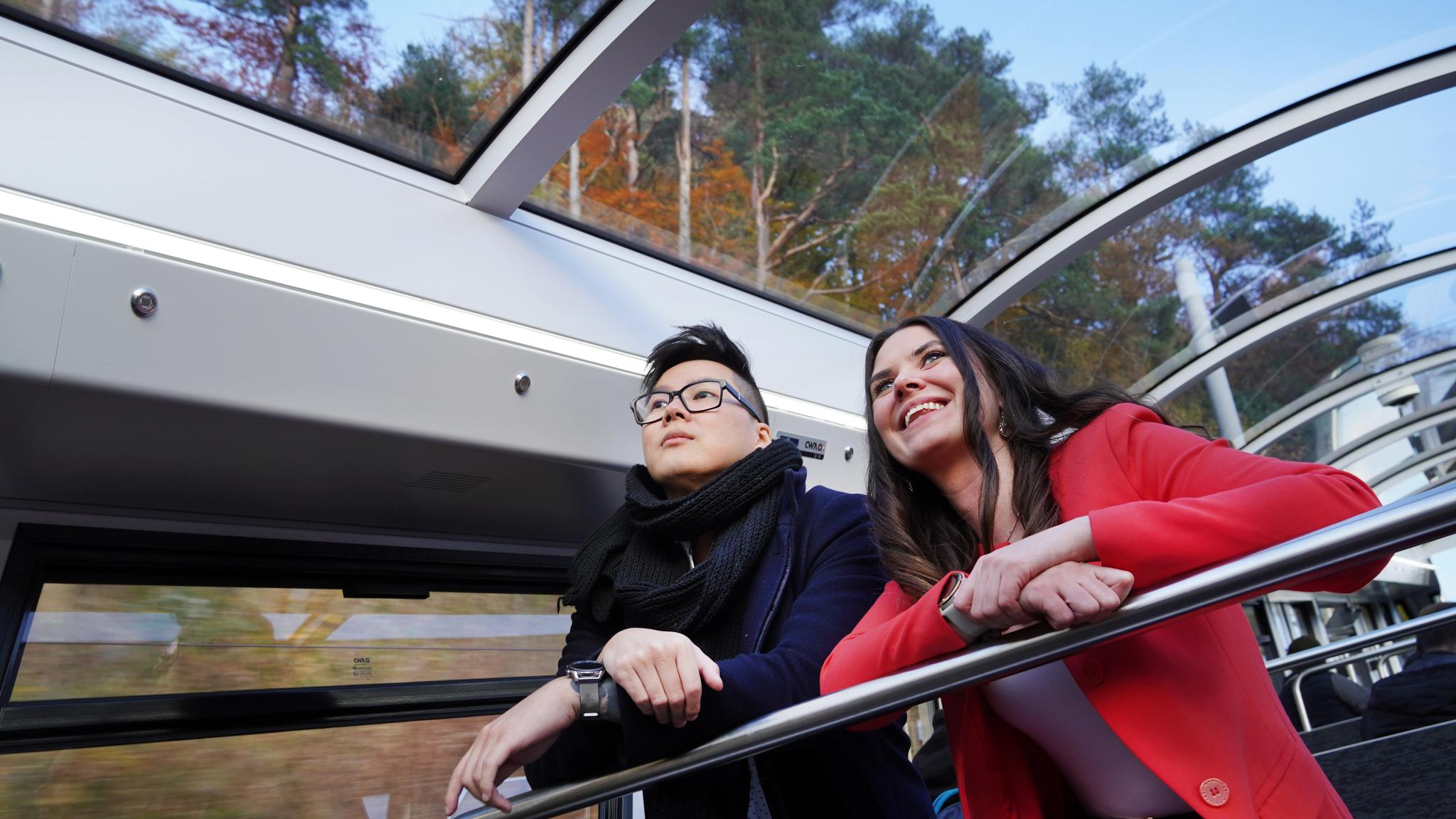 Two persons in a funicular