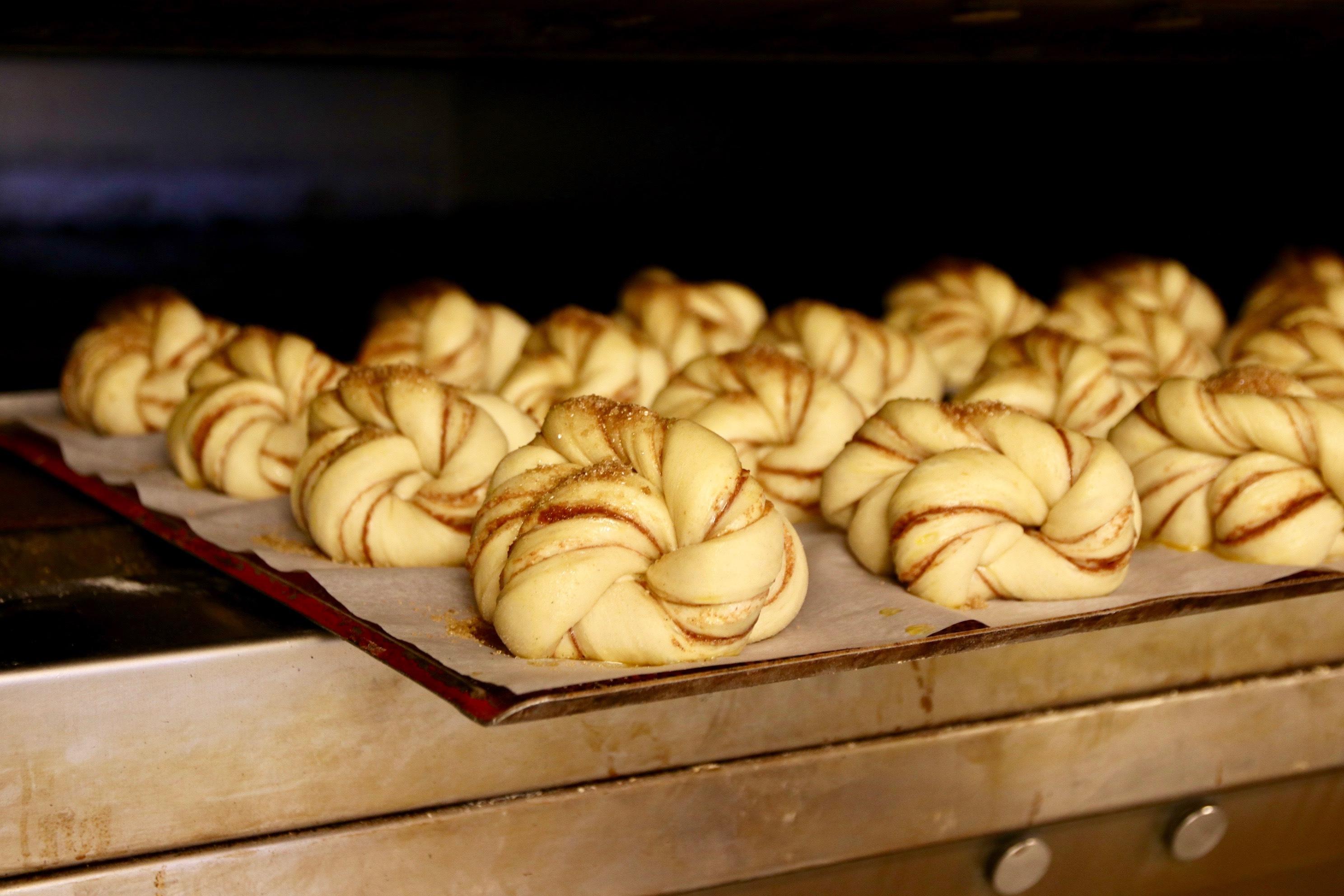 Cinnamon buns on a tray ready to go in the oven