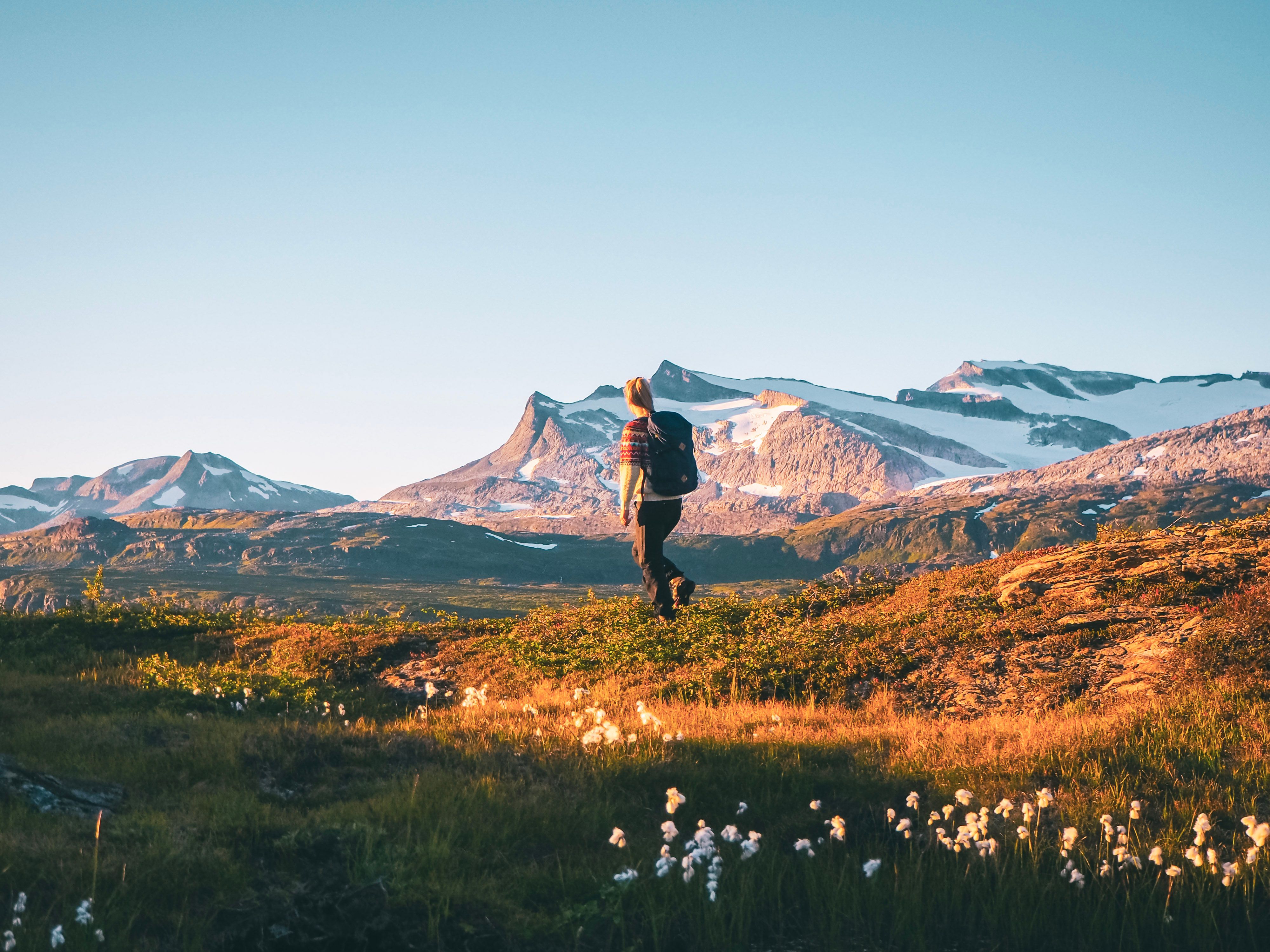 Girl walking in the mountain Melfjellet in Helgeland, at autumn