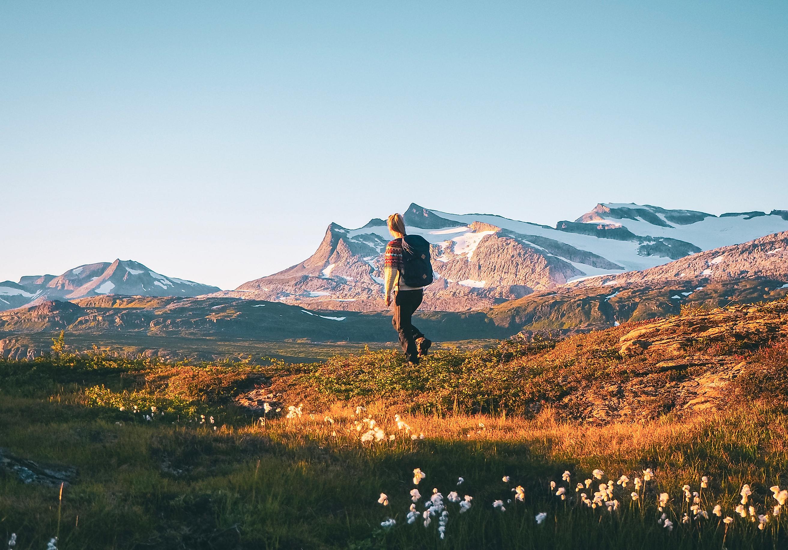 Girl walking in the mountain Melfjellet in Helgeland, at autumn