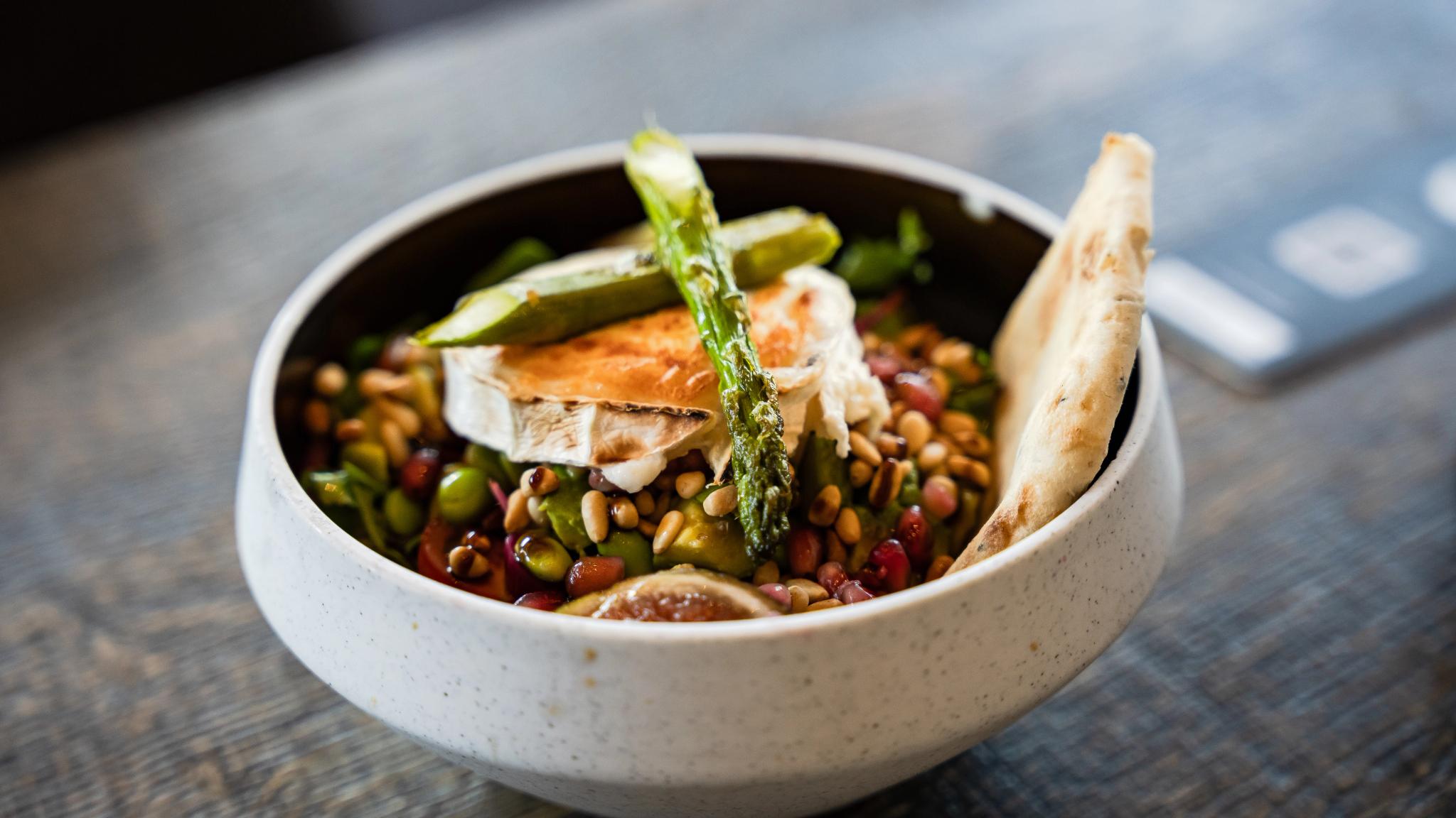 A bowl of colourful vegetables.