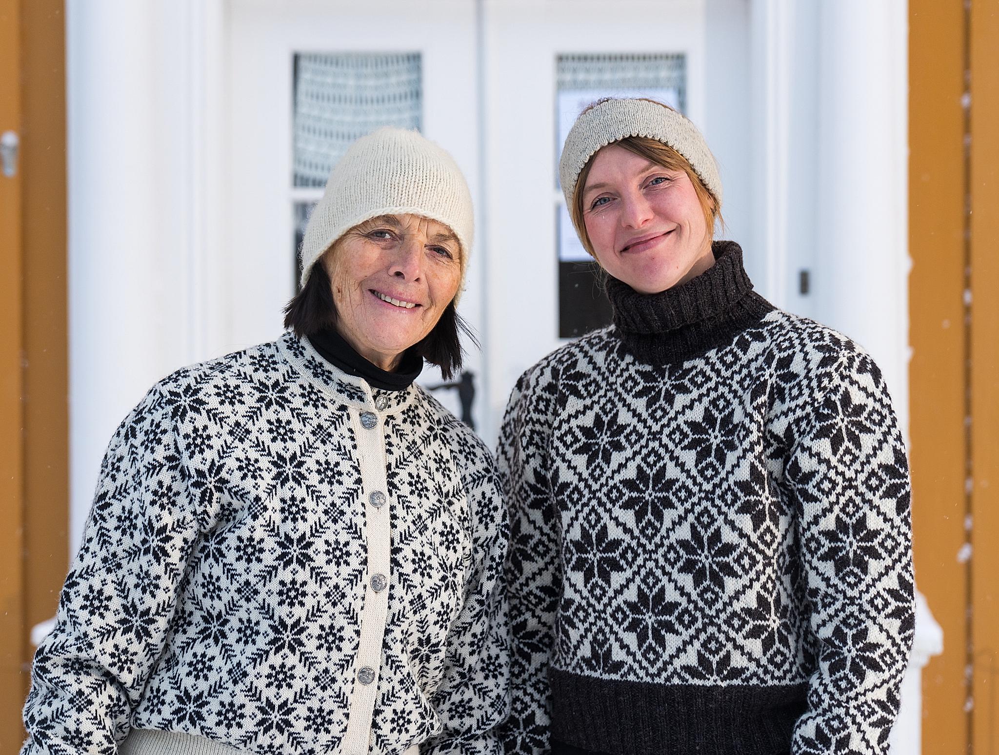 Two woman outside of the Selbu Husflidscentral in Selbu, Trøndelag, Norway.