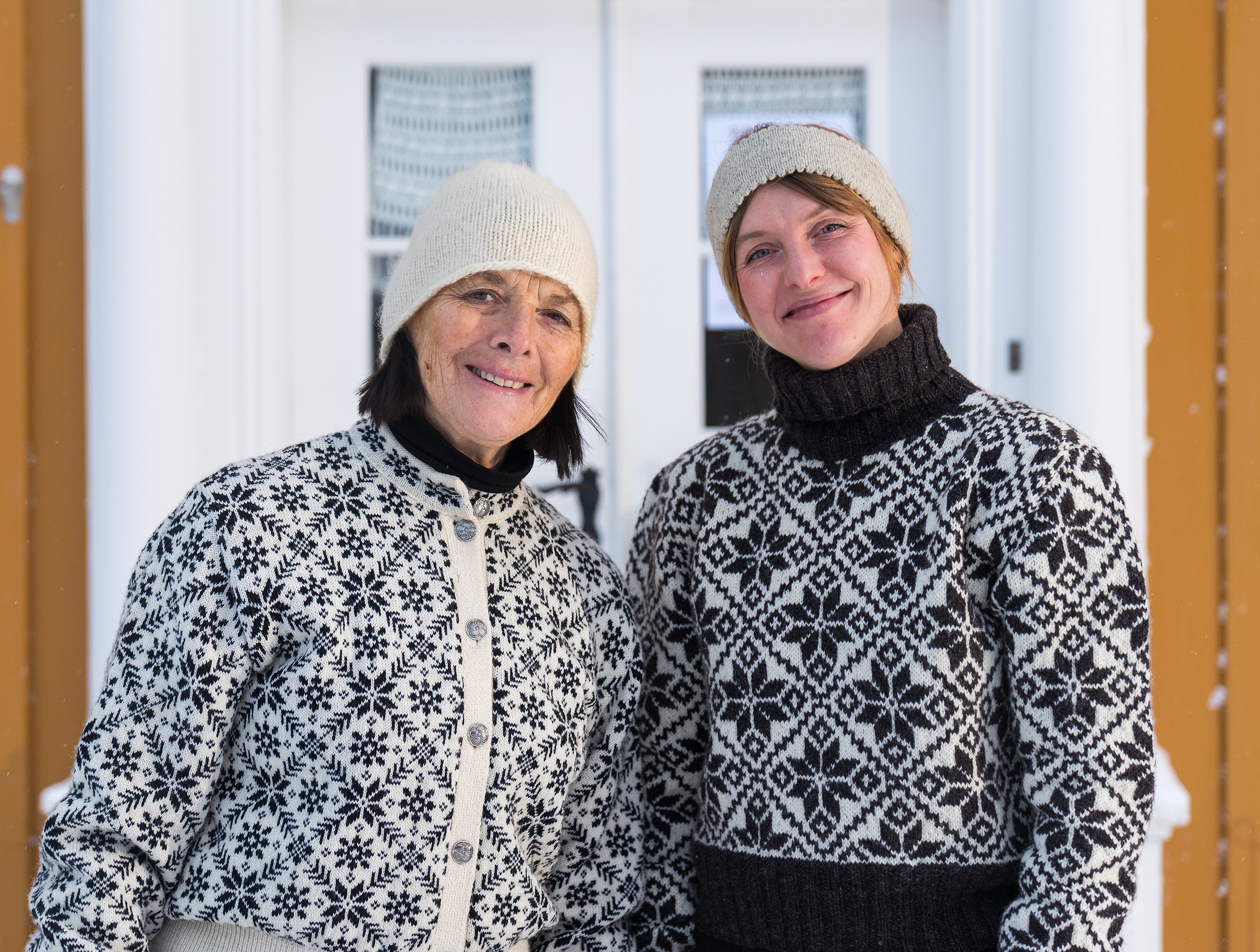 Two woman outside of the Selbu Husflidscentral in Selbu, Trøndelag, Norway.
