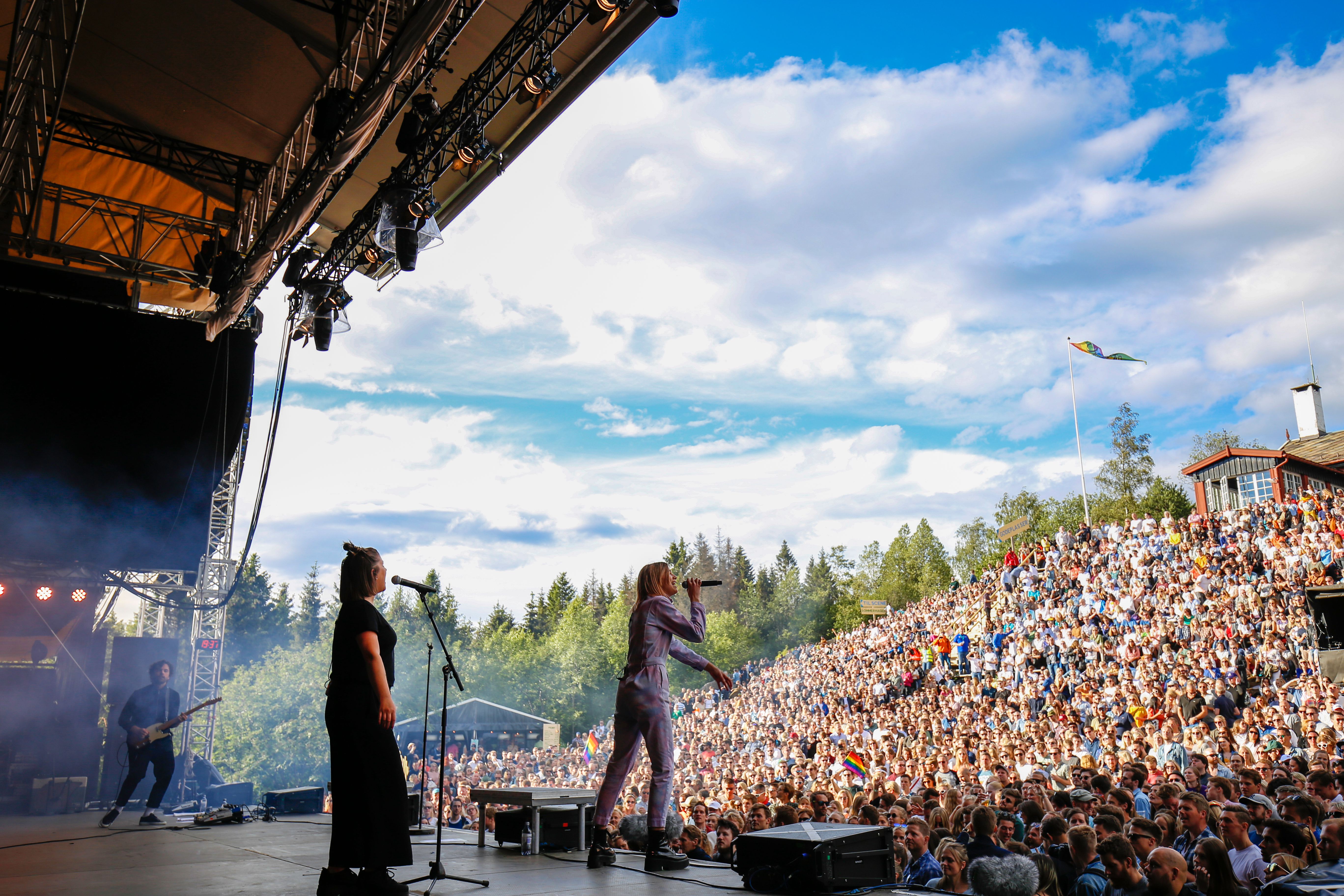 A musican performing in front of a large crowd at OsloOslo music festival at Grefsenkollen in Oslo, Eastern Norway