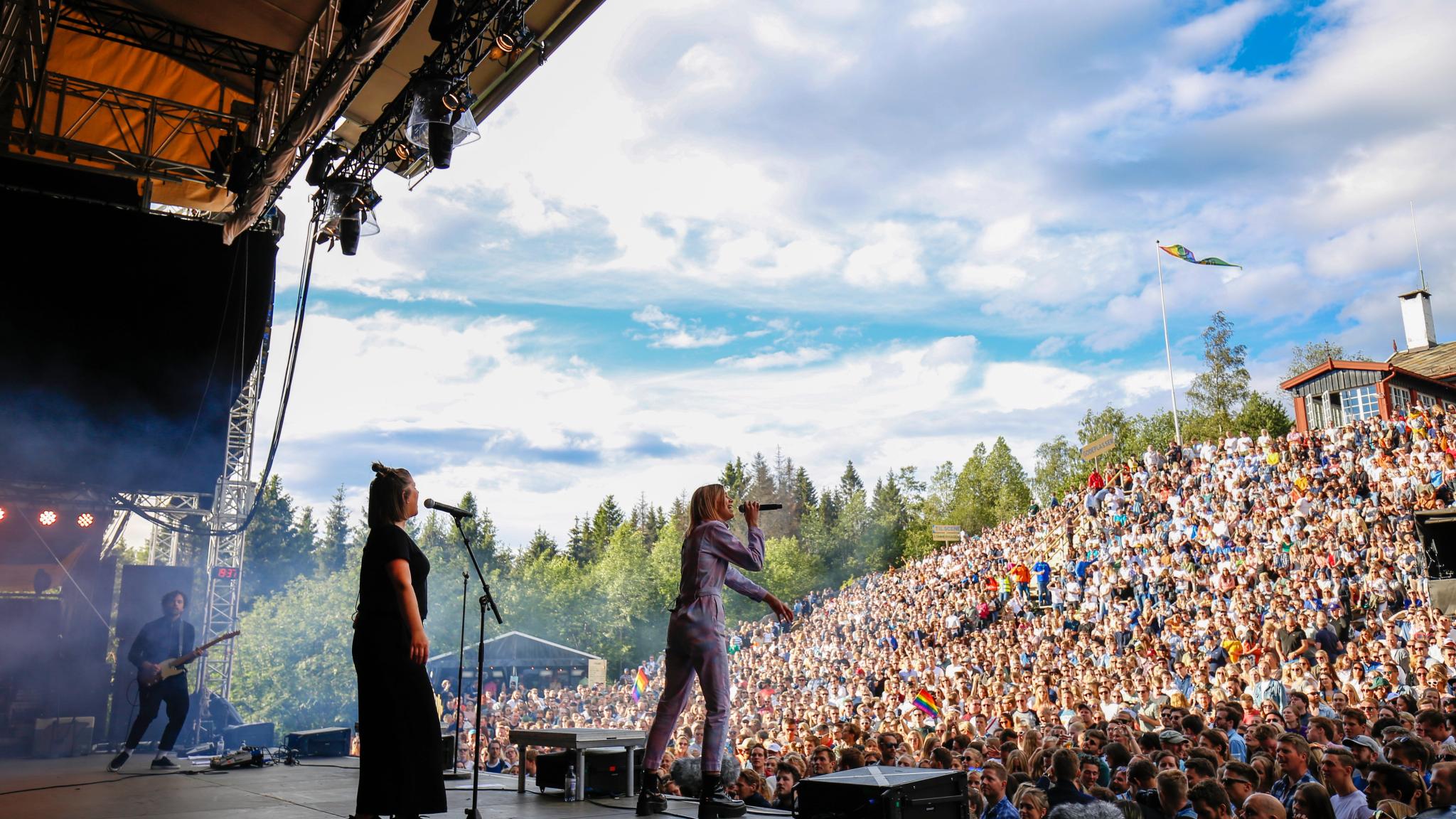 A musican performing in front of a large crowd at OsloOslo music festival at Grefsenkollen in Oslo, Eastern Norway