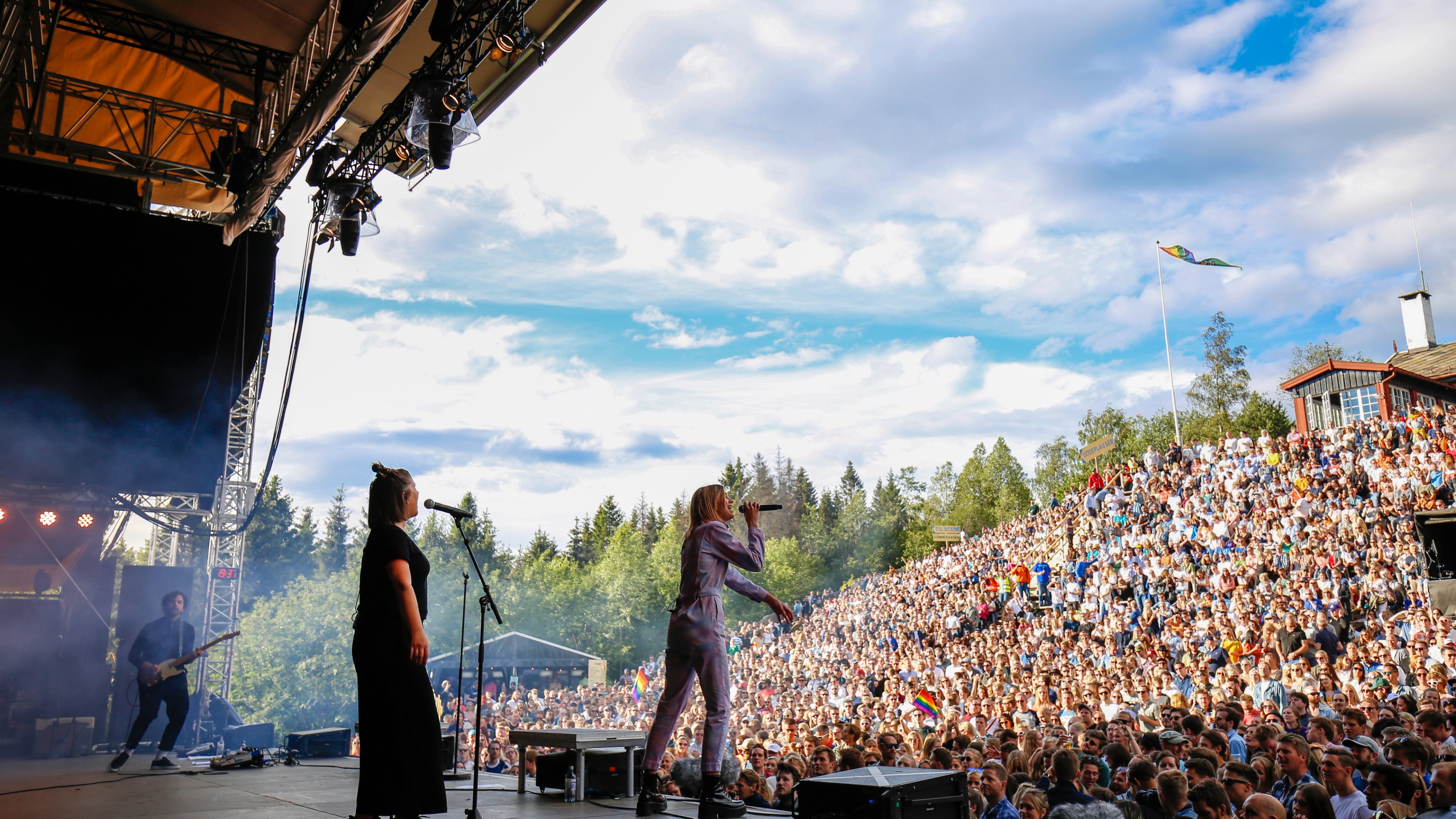 A musican performing in front of a large crowd at OsloOslo music festival at Grefsenkollen in Oslo, Eastern Norway