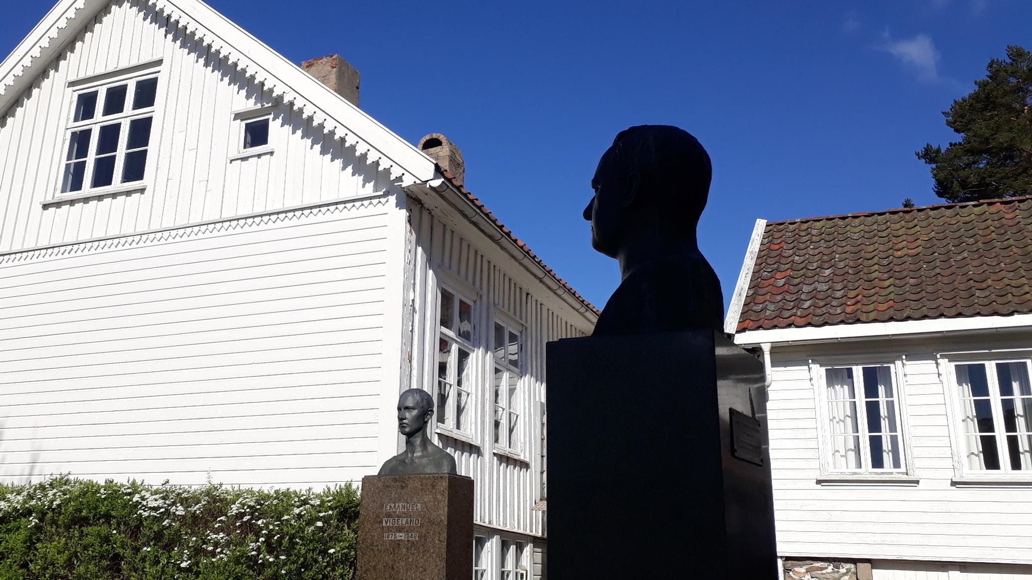 Busts of the artists Gustav and Emanuel Vigeland outside of their childhood home Vigelands hus in Mandal, Southern Norway
