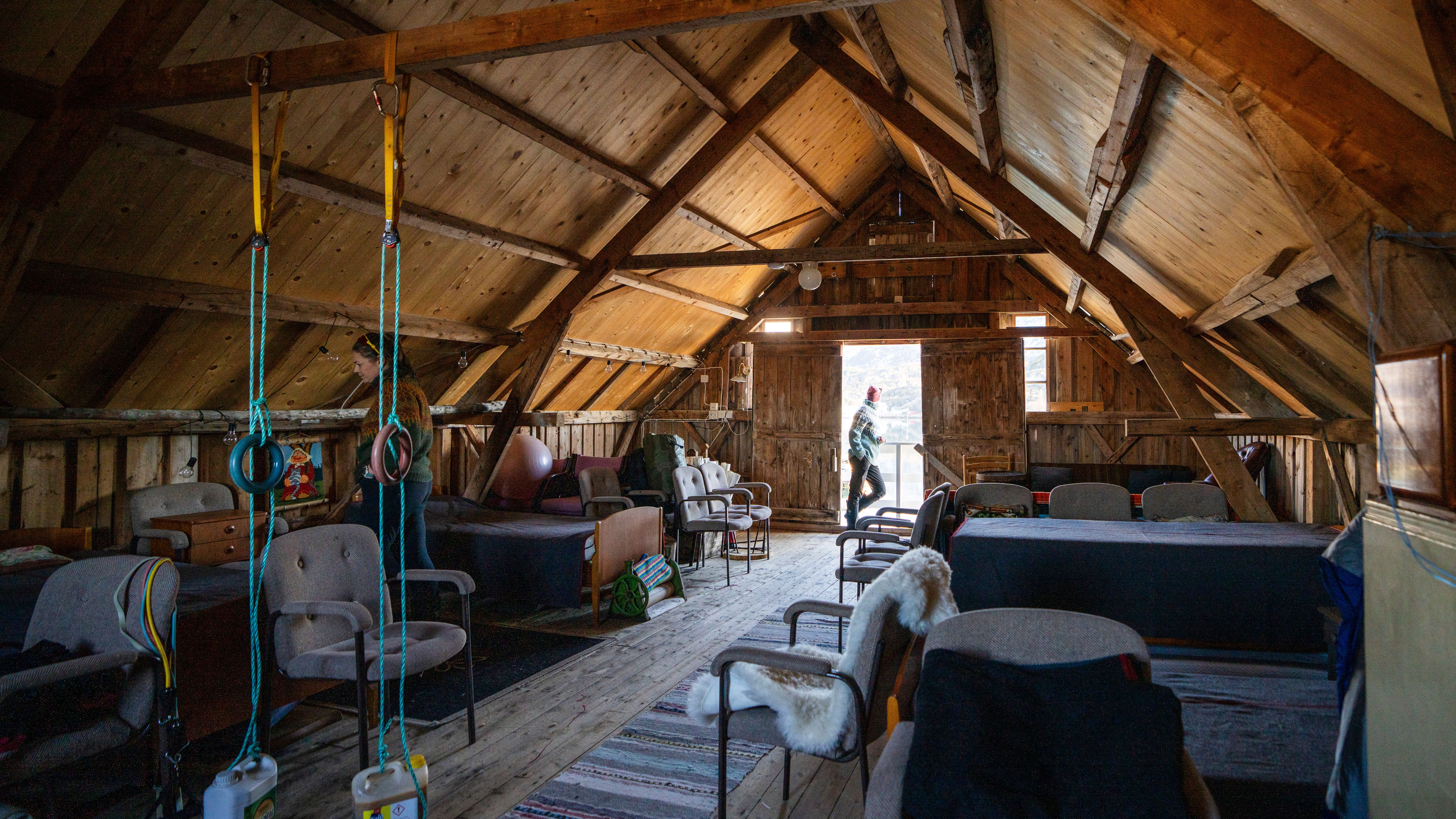 A loft at a sea shack with vintage furniture.