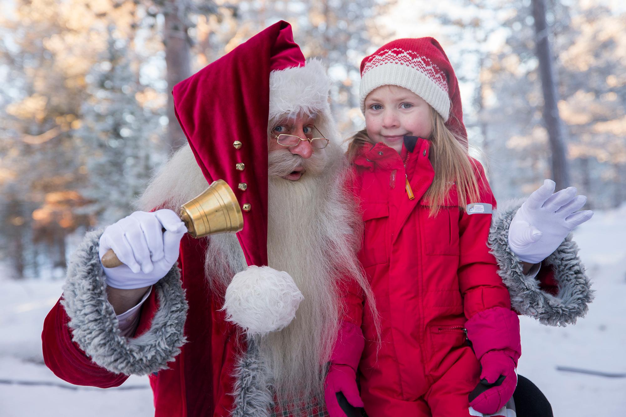 Santa Claus and a girl at one of Norway’s top Christmas destinations, Savalen