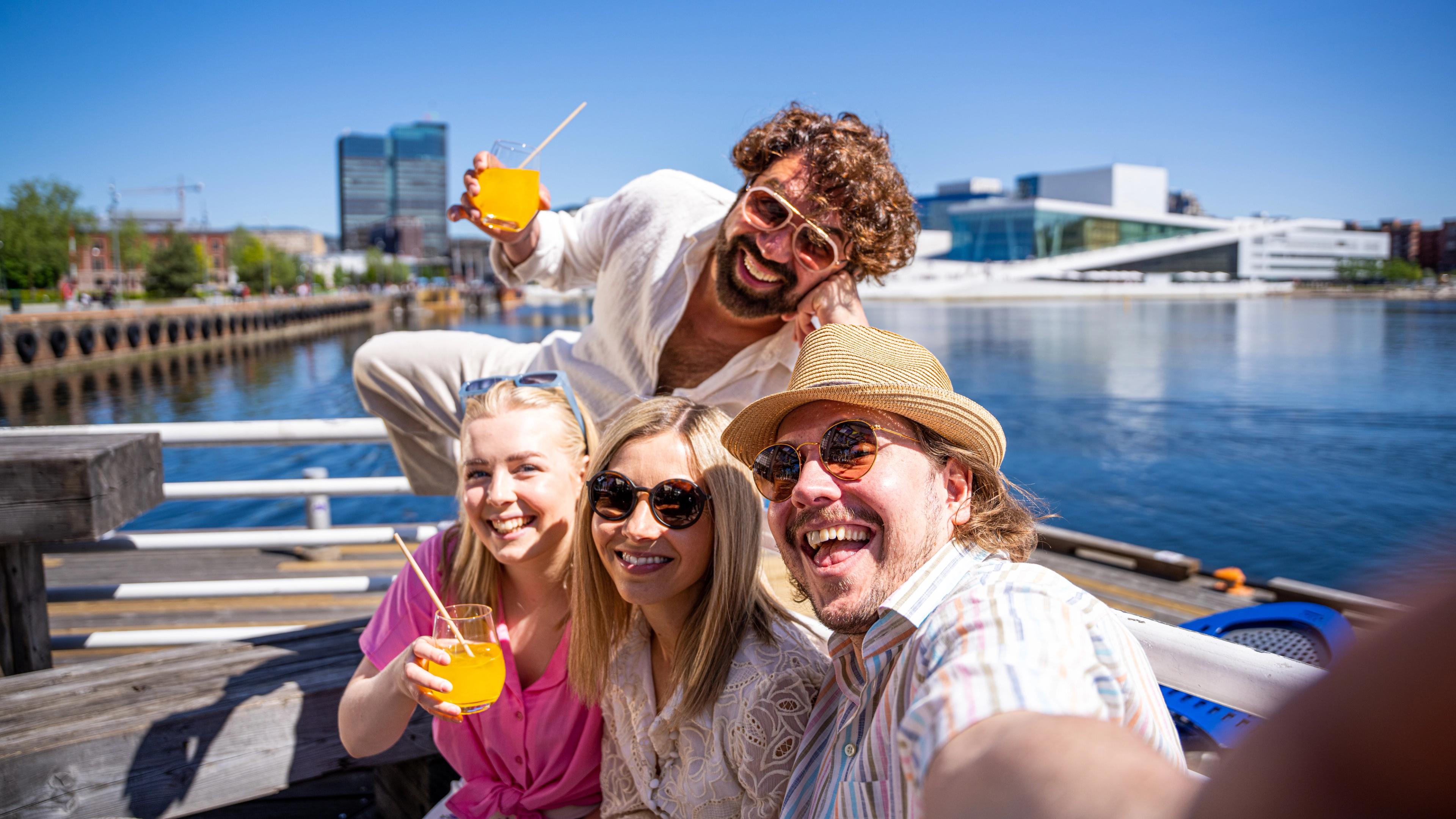 Friend group taking a selfie by Salt in Oslo, Eastern Norway