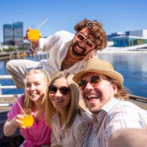 Friend group taking a selfie by Salt in Oslo, Eastern Norway