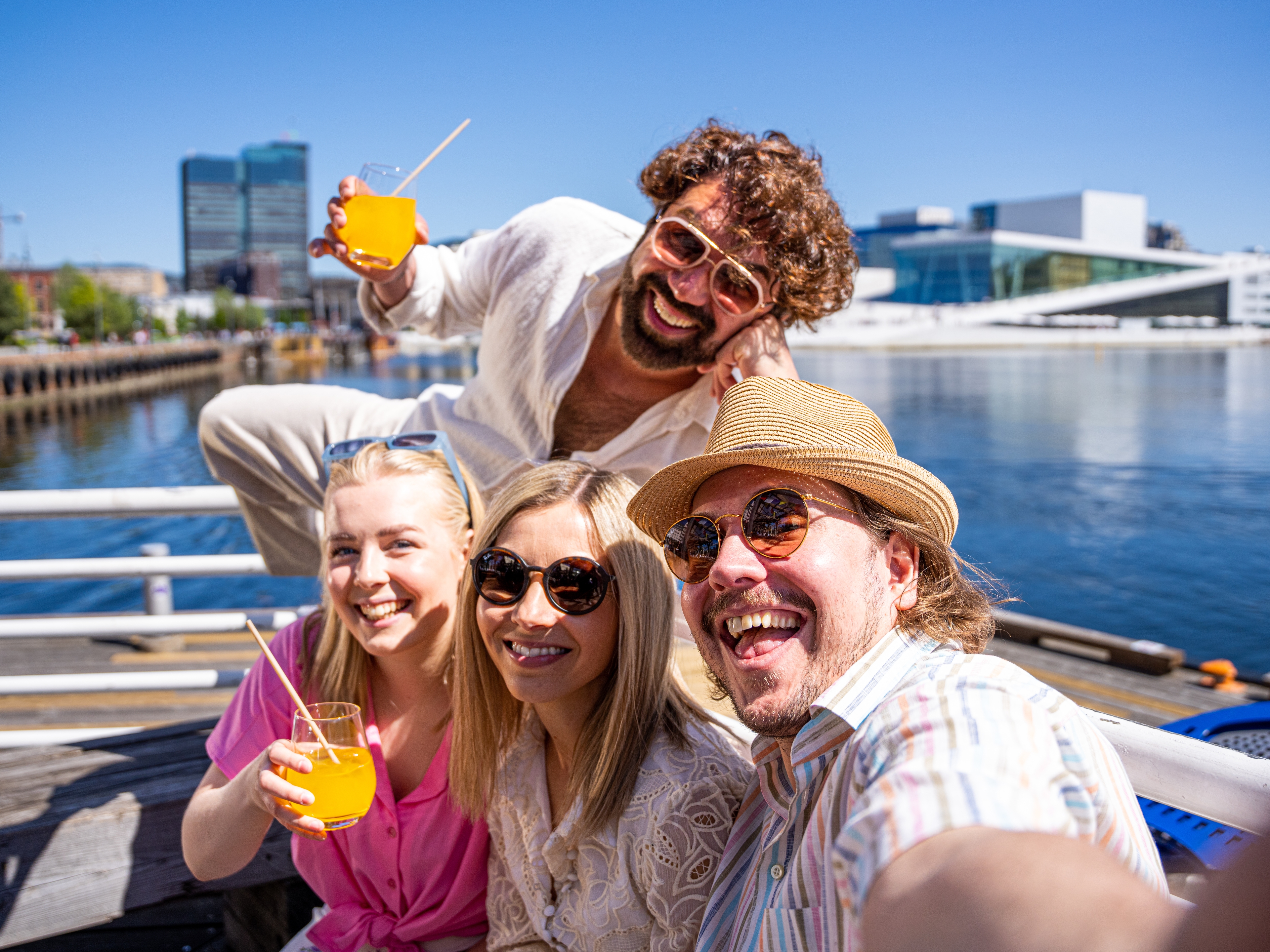 Friend group taking a selfie by Salt in Oslo, Eastern Norway