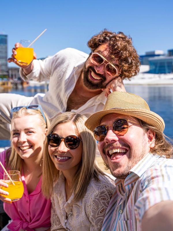 Friend group taking a selfie by Salt in Oslo, Eastern Norway