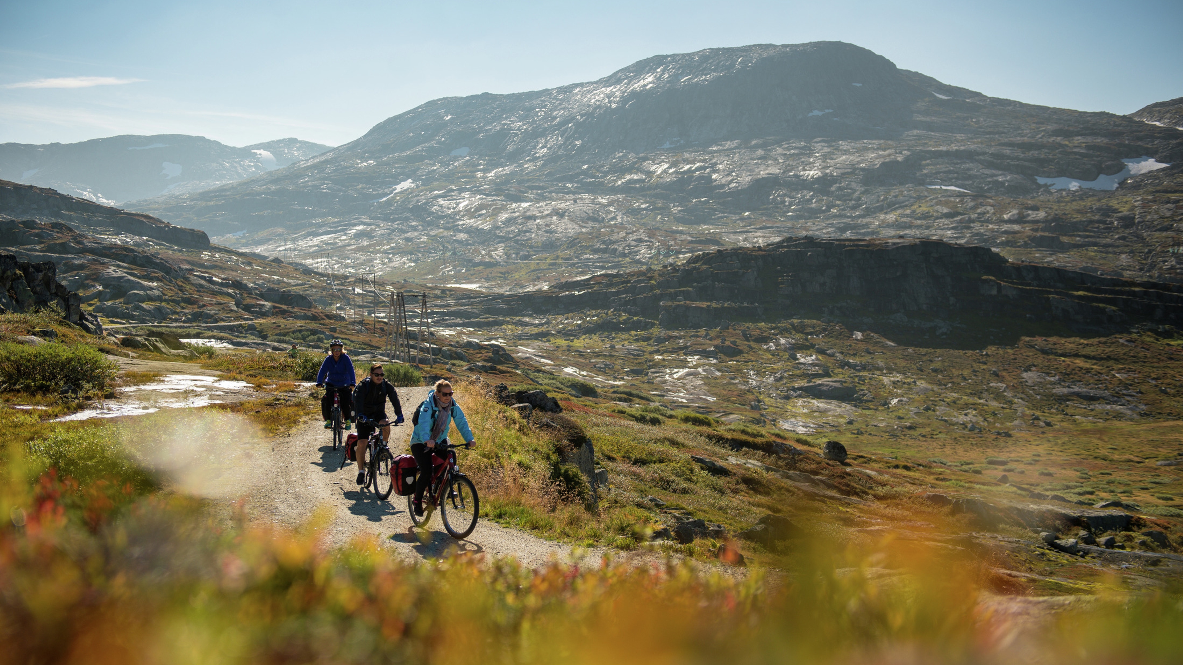 Cyclists on the Rallarvegen bike route in Fjord Norway