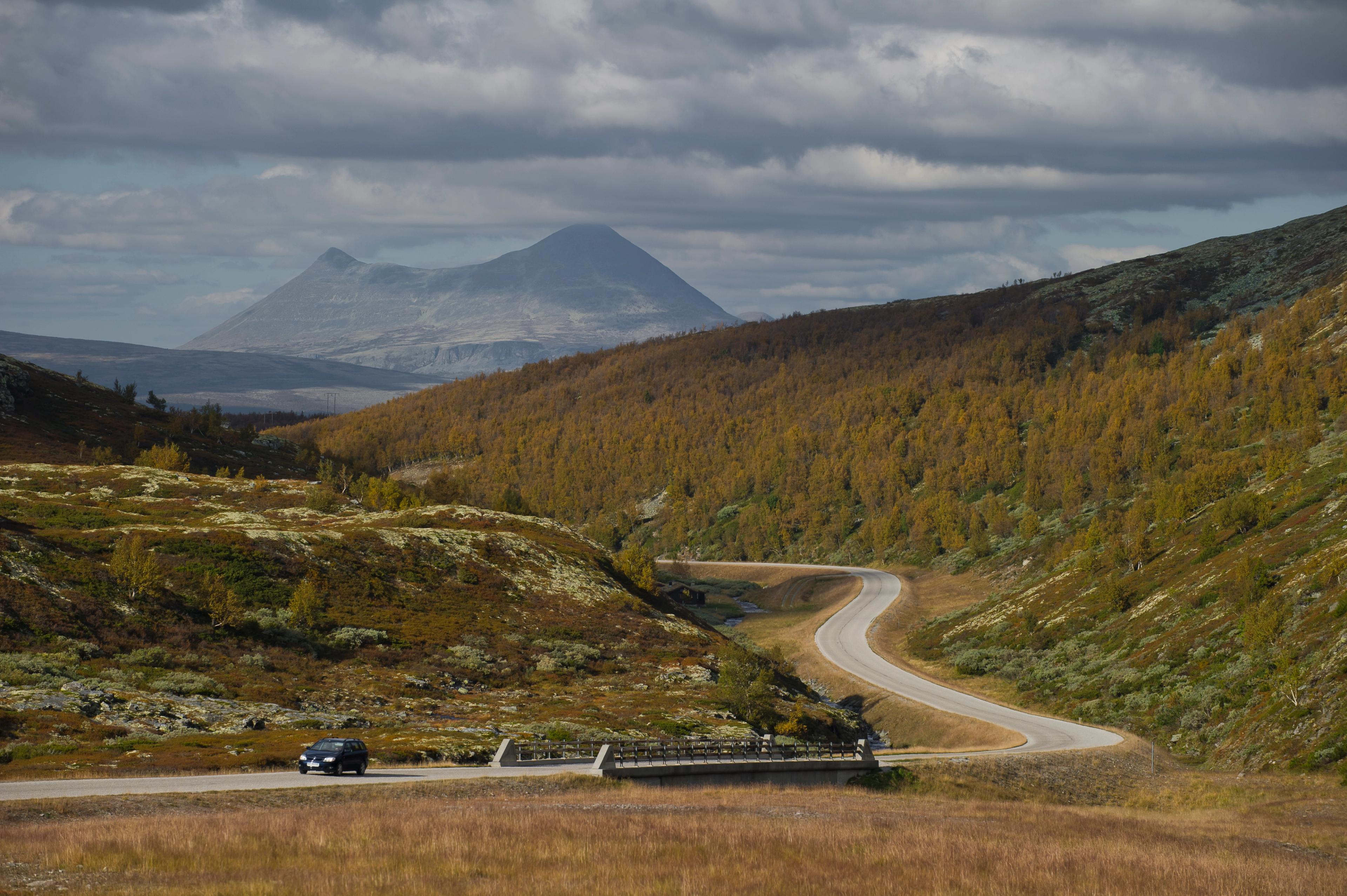 Car driving on a road near the Dovrefjell mountains, Eastern Norway