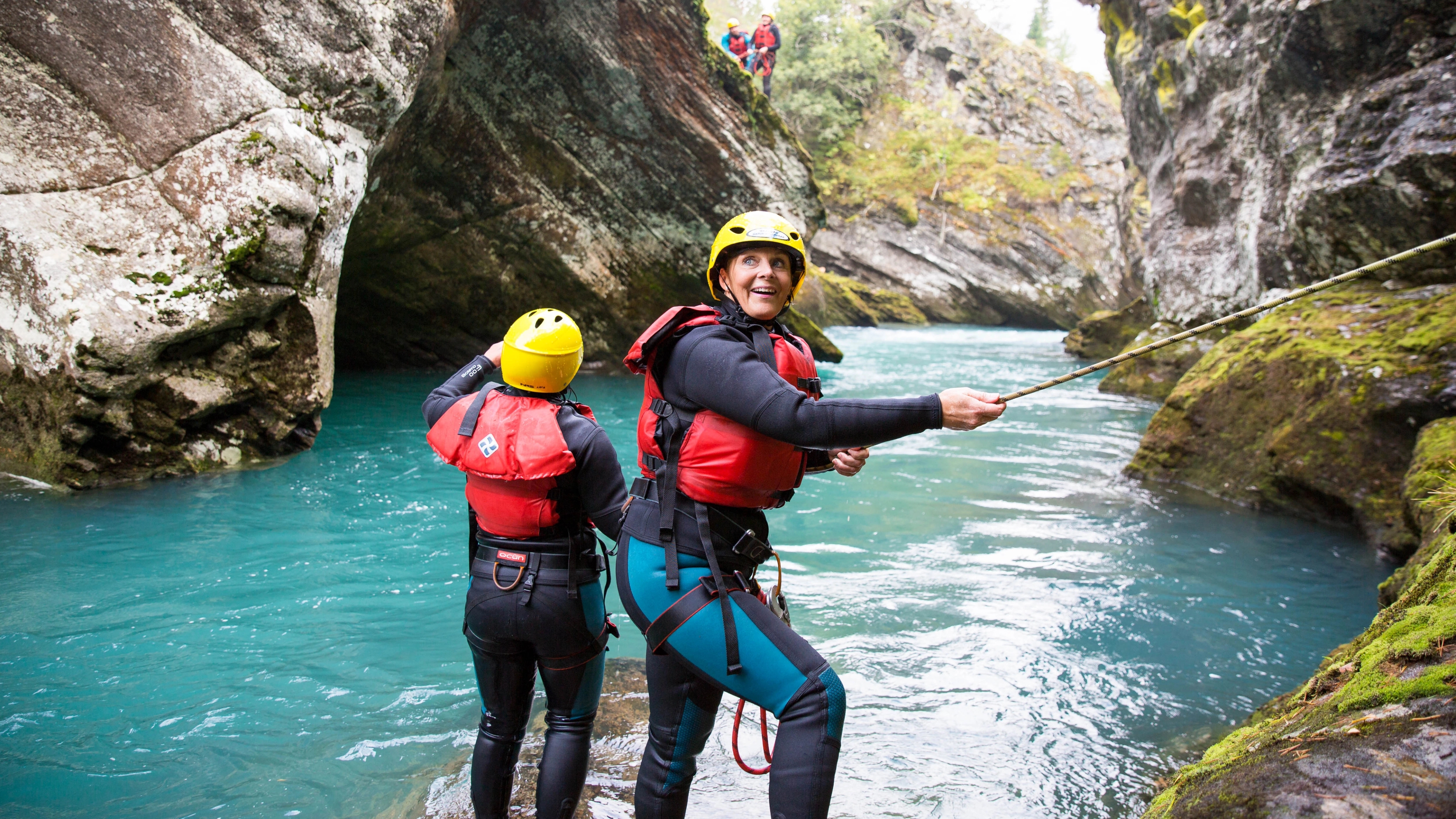 People canyoning in Valldal in Møre og Romsdal in Fjord Norway