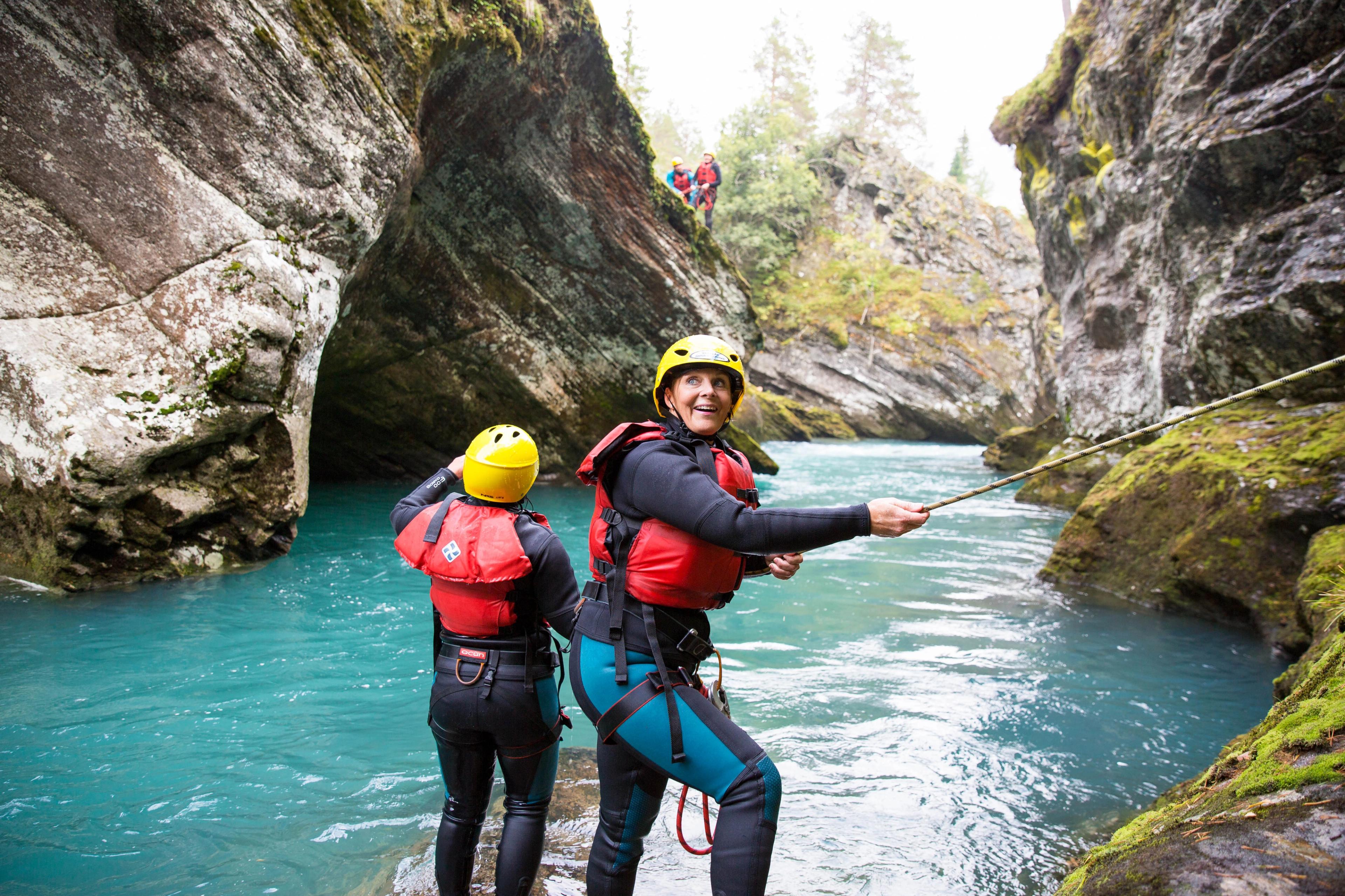 People canyoning in Valldal in Møre og Romsdal in Fjord Norway