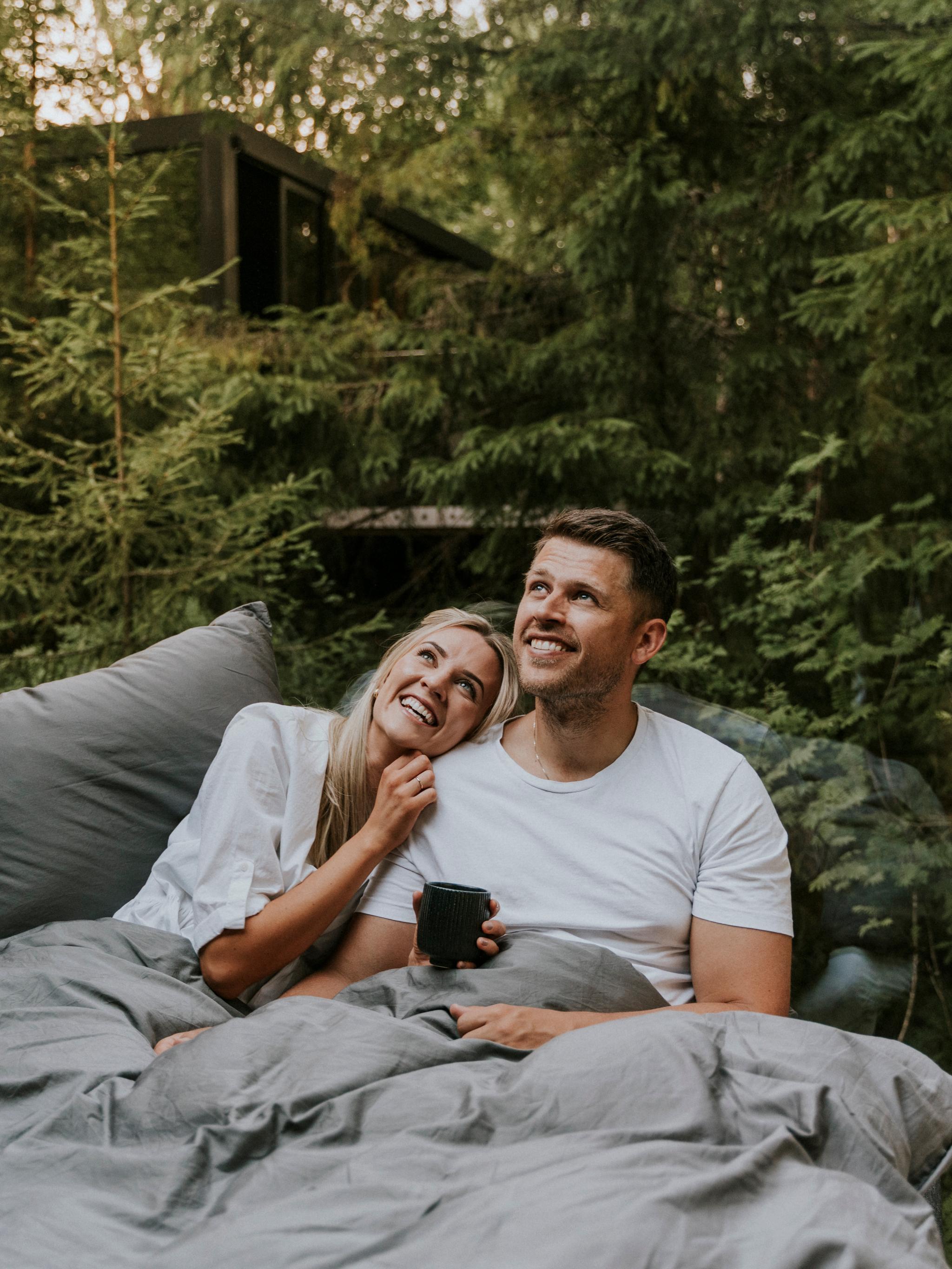 A man and a woman in bed at Laagen in Vestfold in Eastern Norway