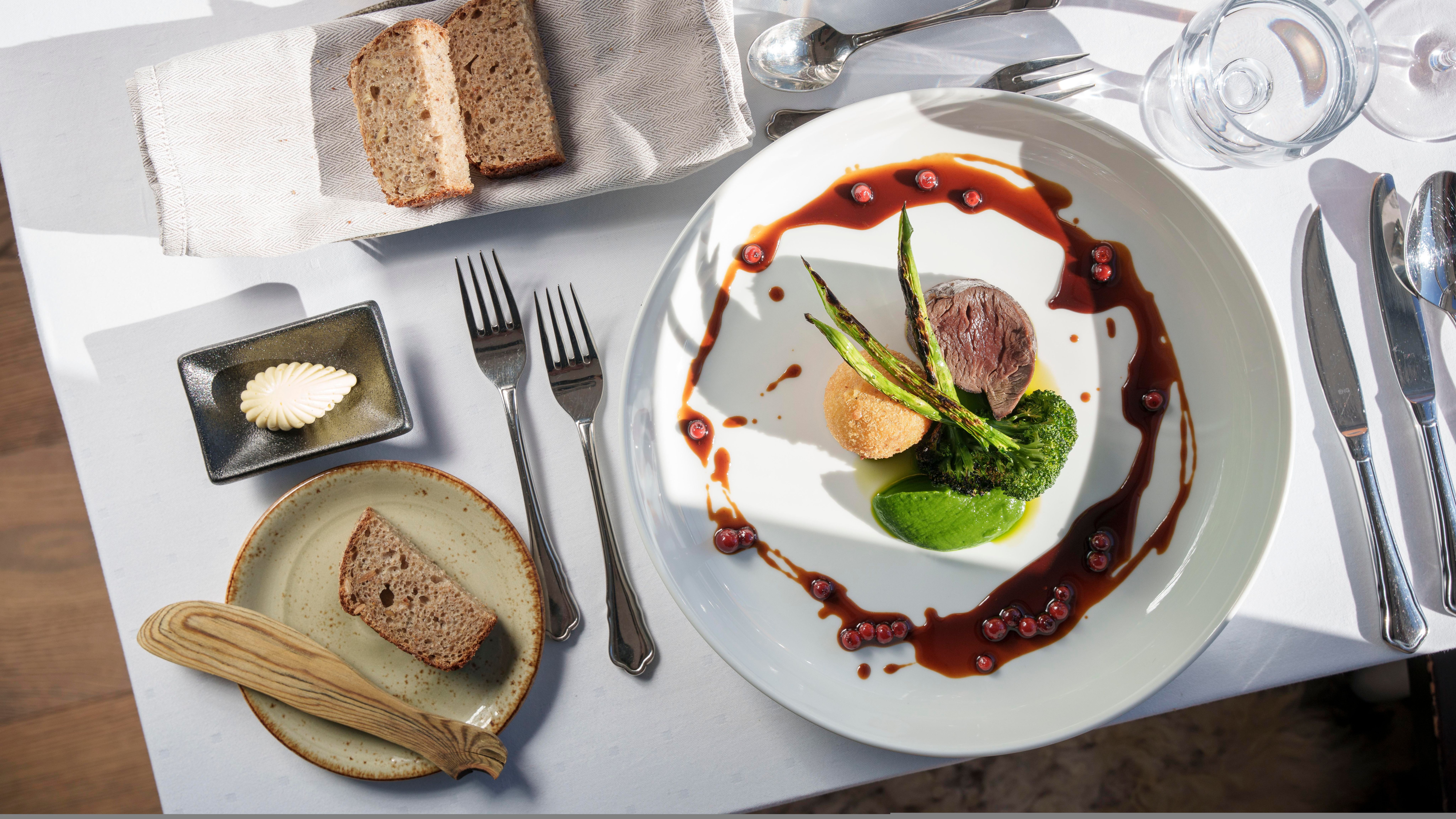 Food at a plate on a table in the restaurant at Skåbu mountain hotel, Skåbu, Norway.