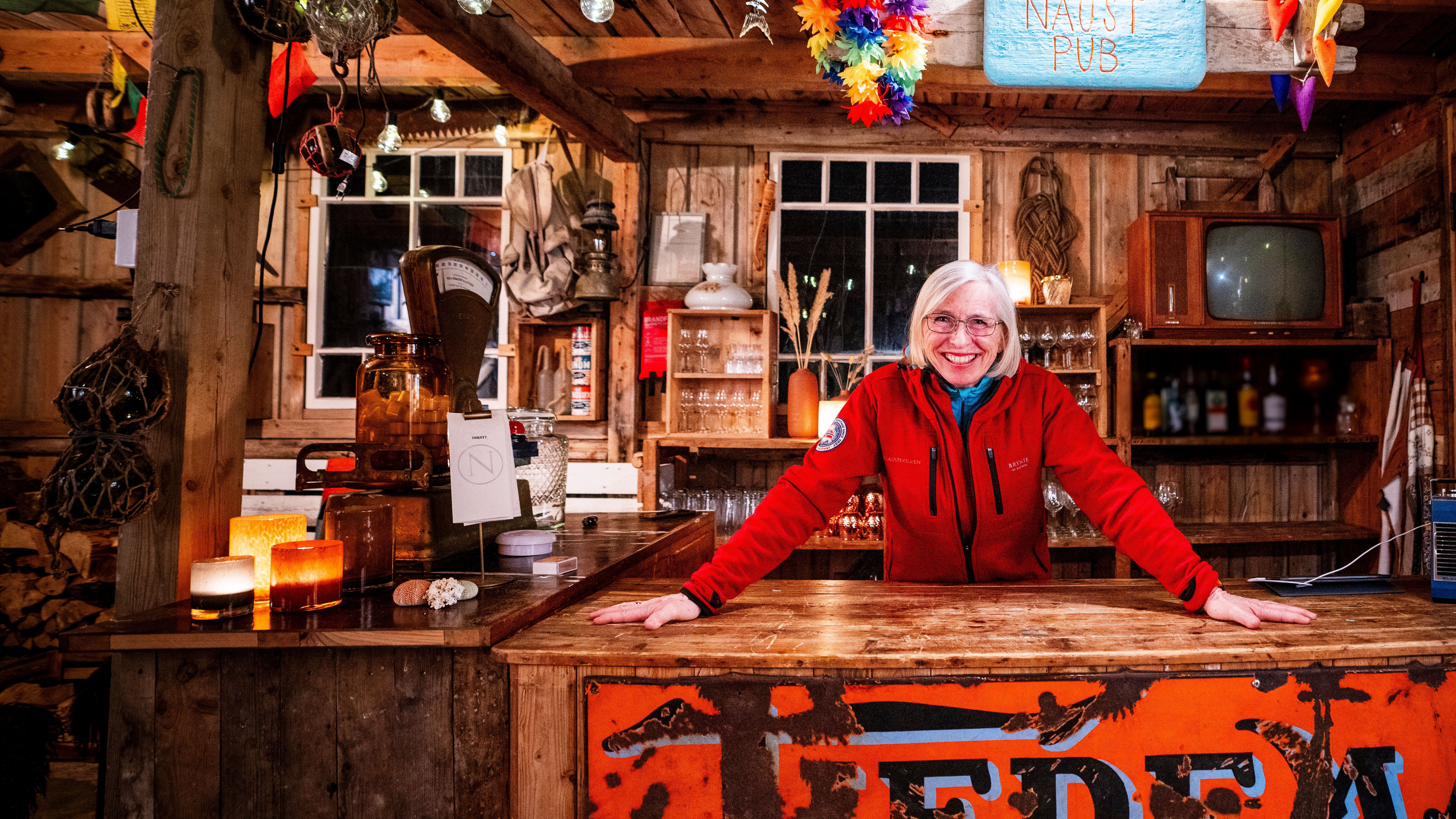 A woman inside a old fashioned store