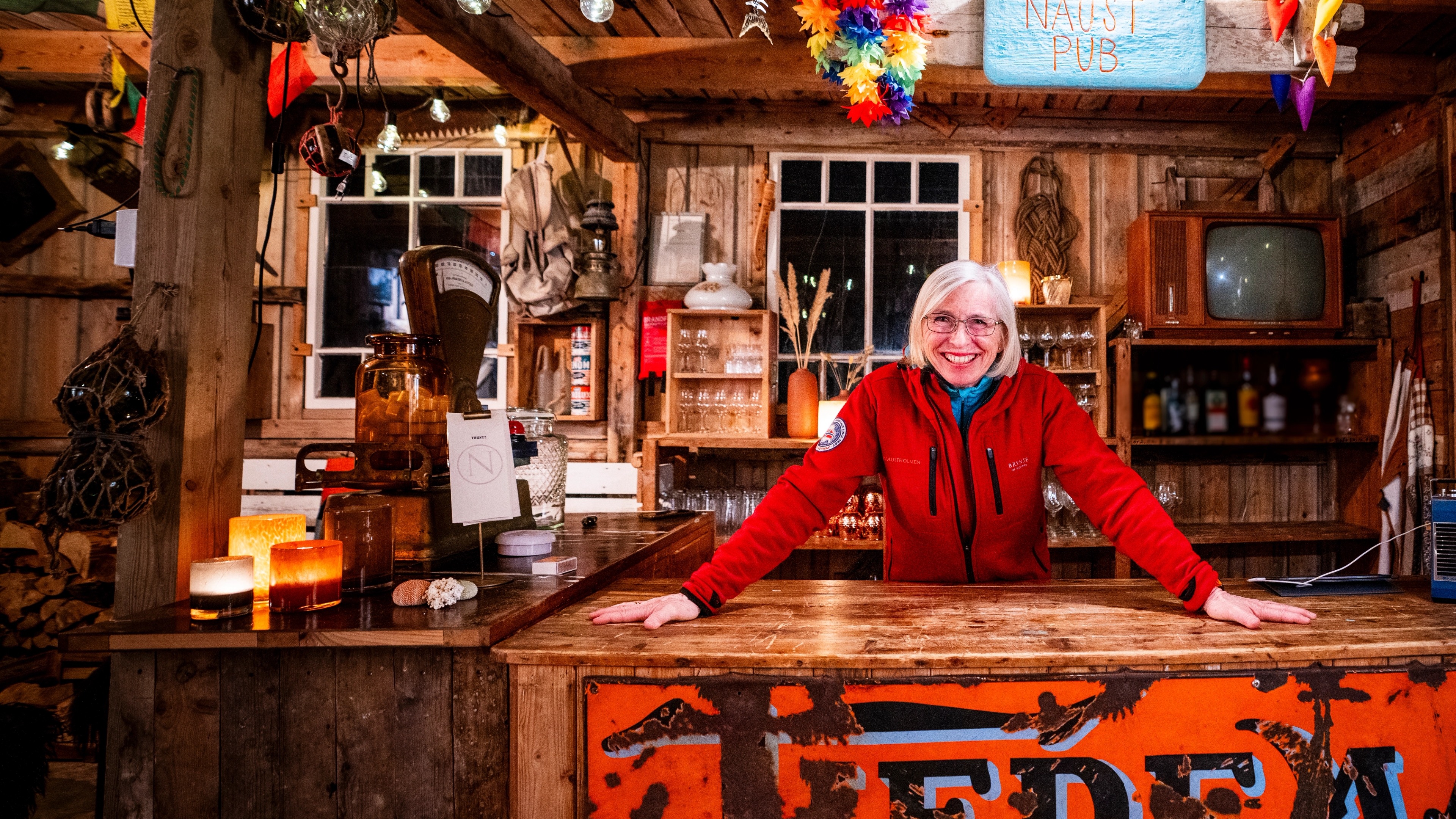 A woman inside a old fashioned store
