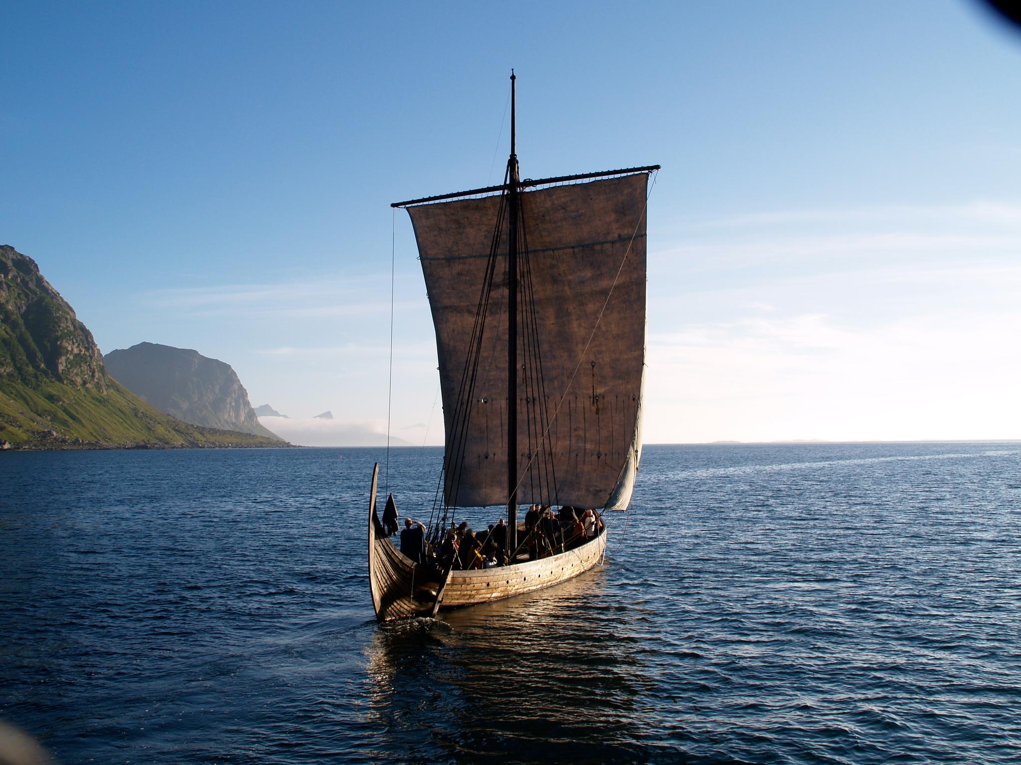A Viking ship sailing on sea.