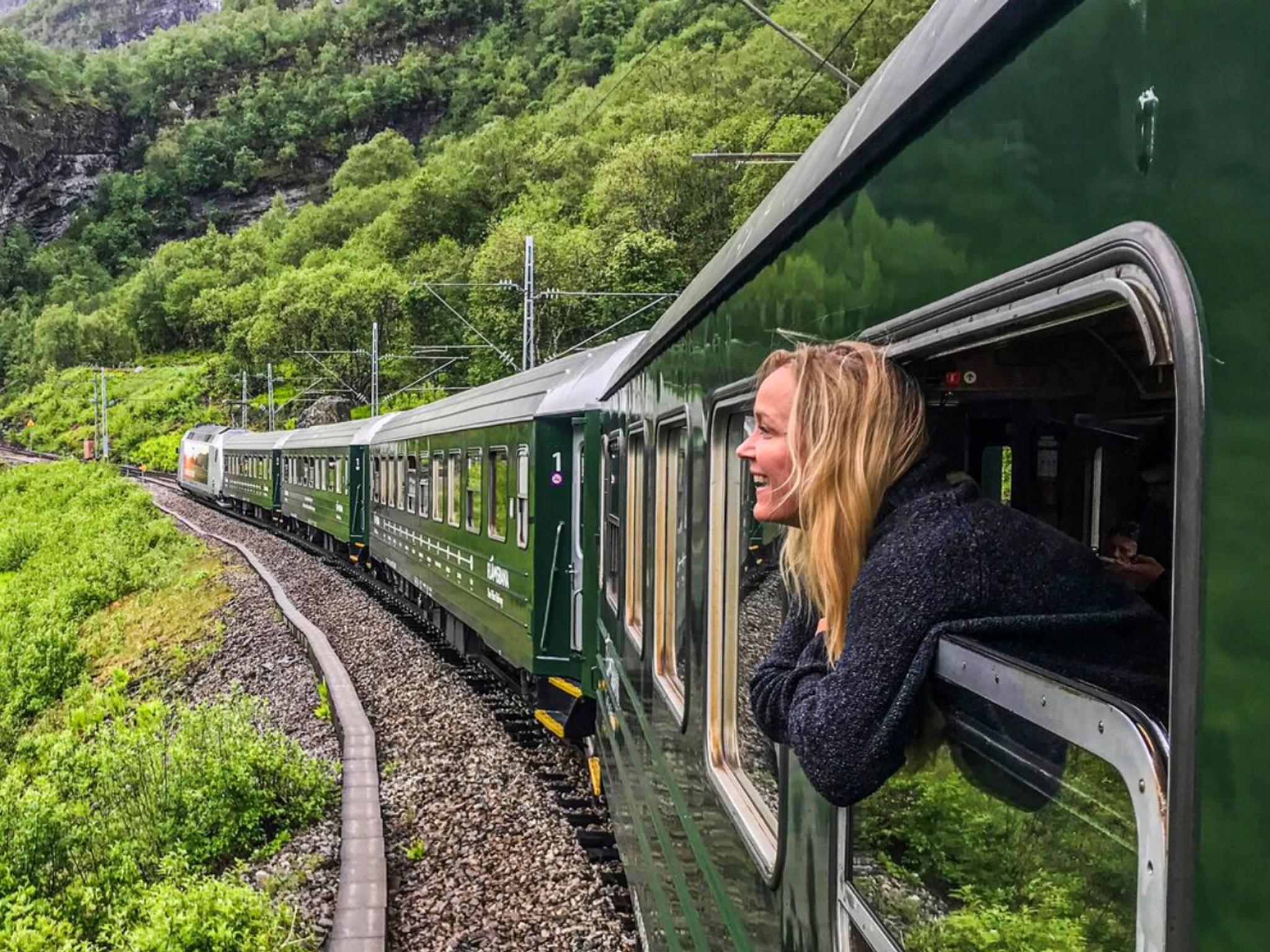 A woman traveling with Flåm railway