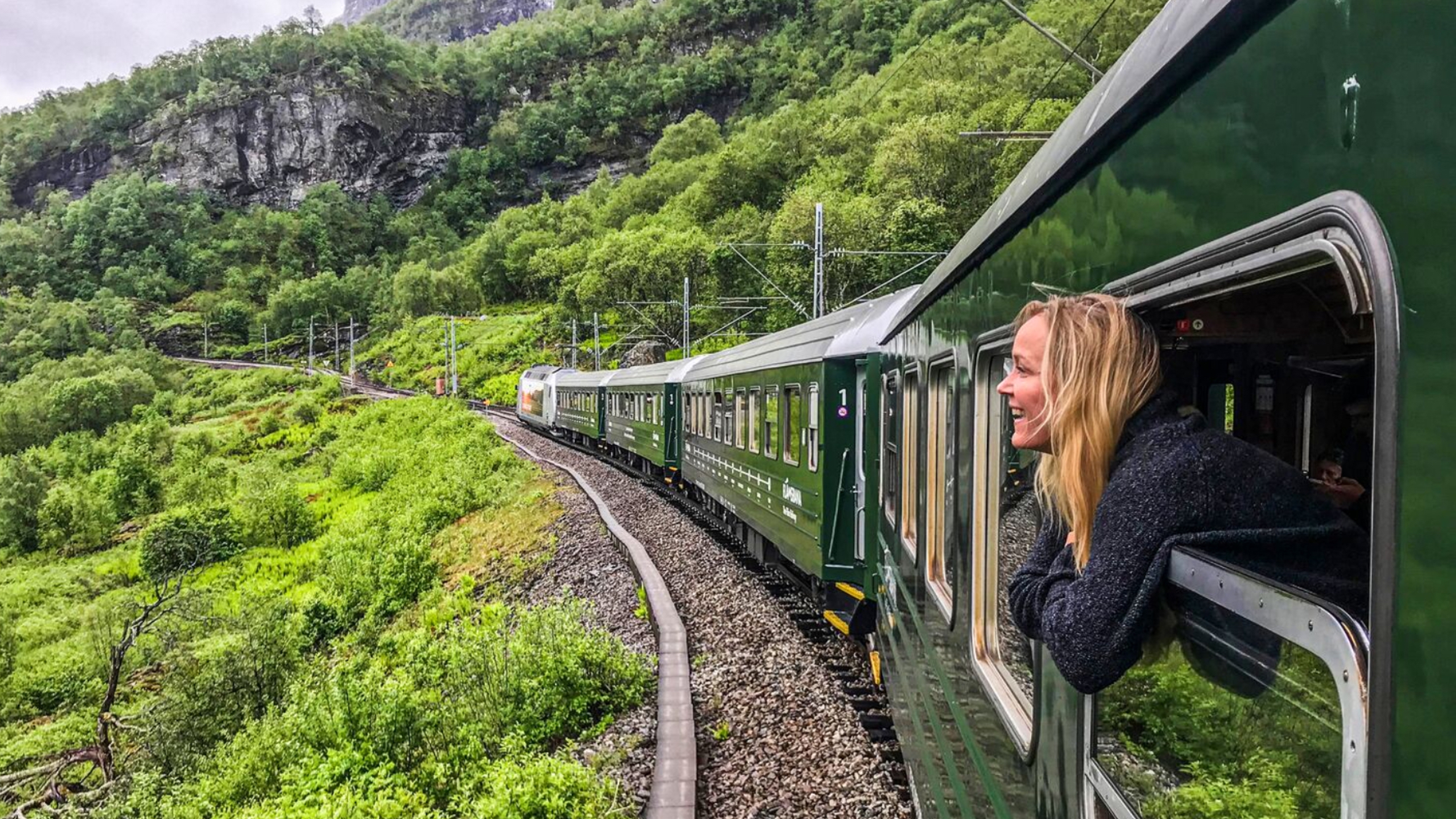 A woman traveling with Flåm railway