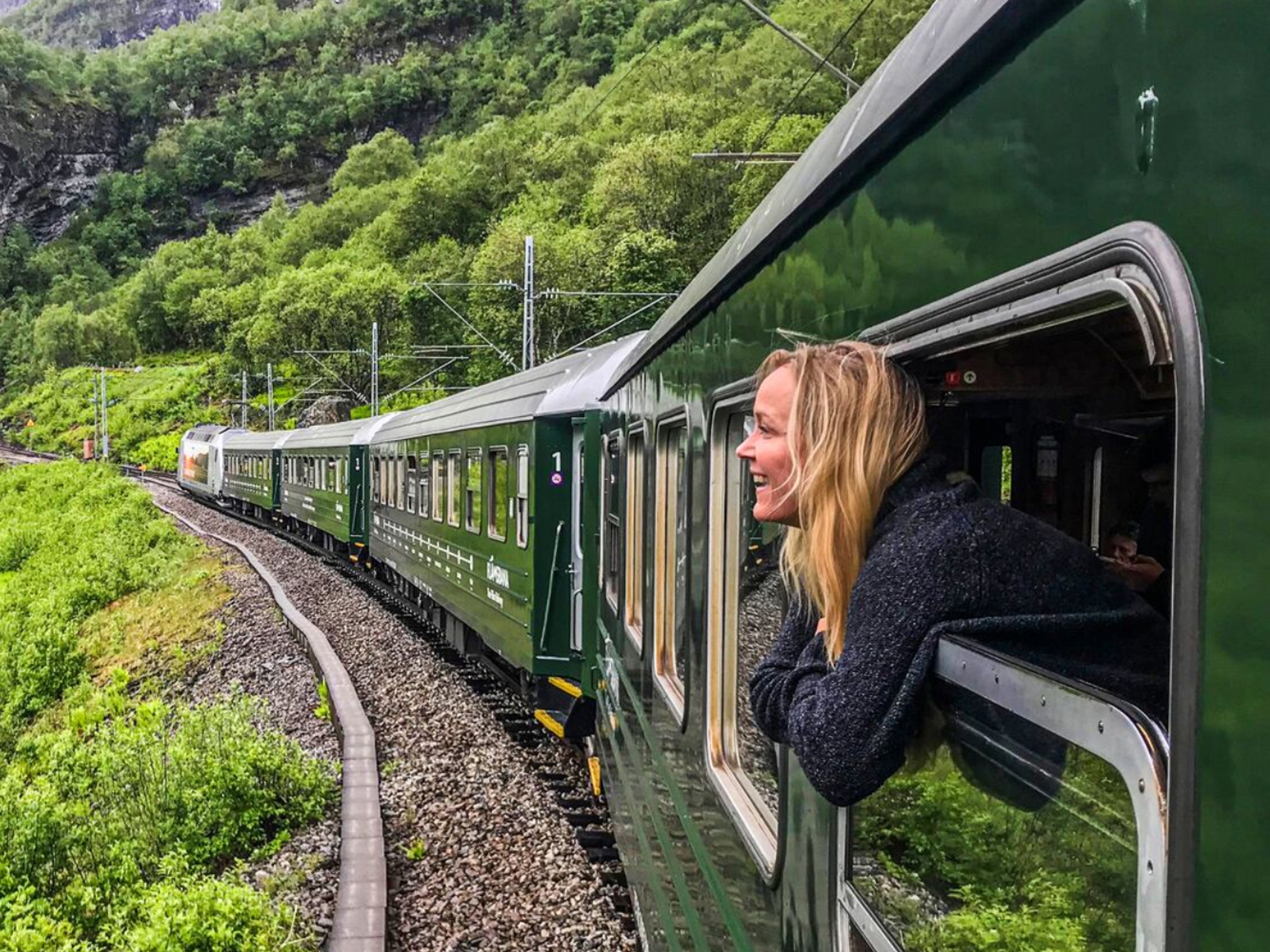 A woman traveling with Flåm railway