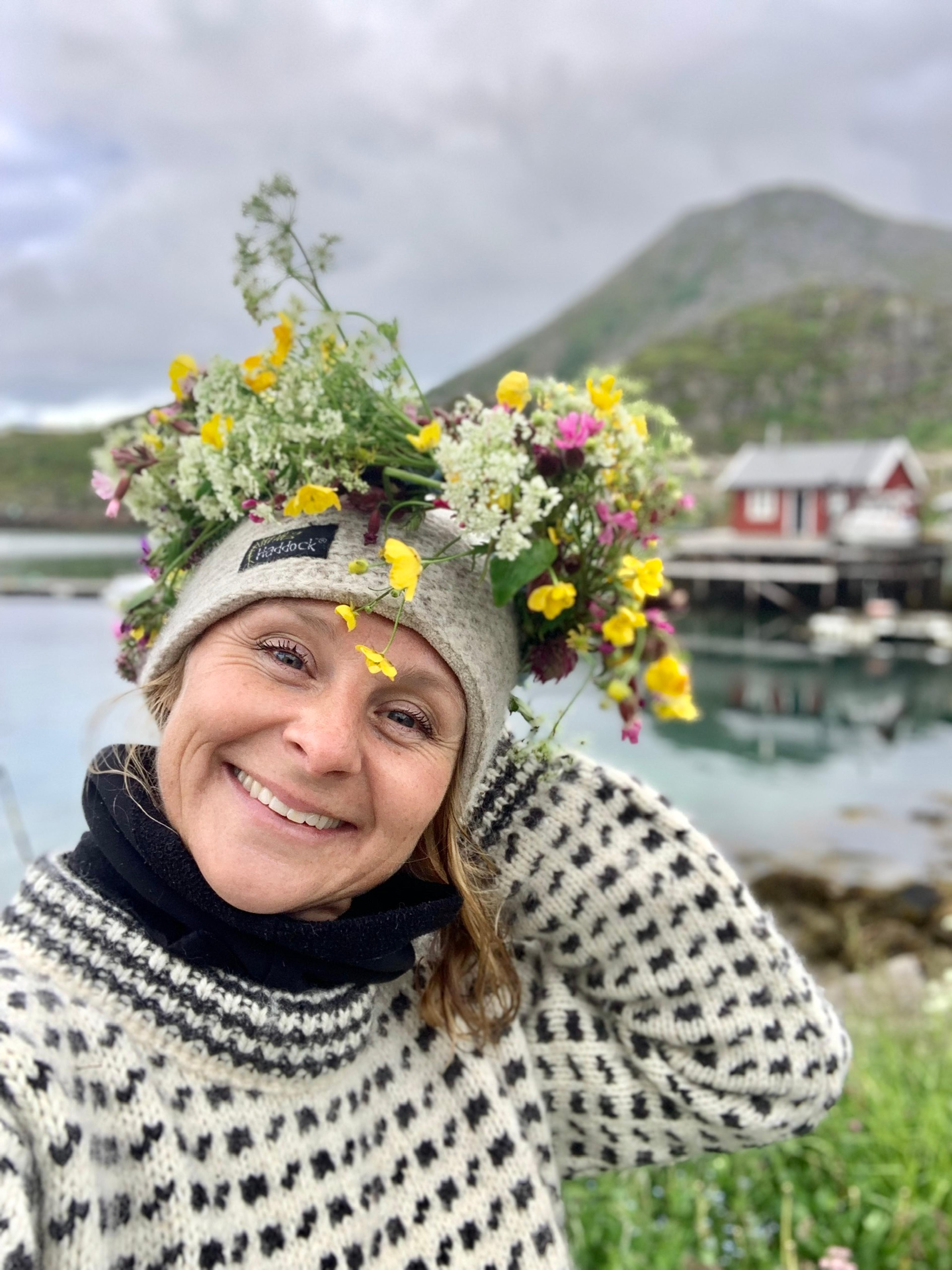 Elin Aamodt with a garland in Lofoten, Northern Norway