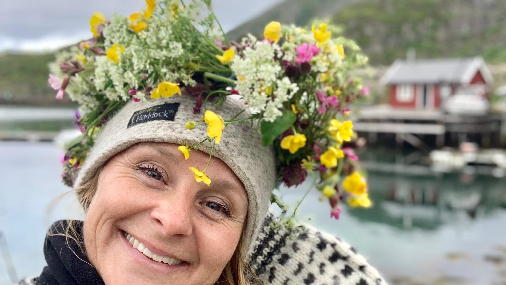 Elin Aamodt with a garland in Lofoten, Northern Norway