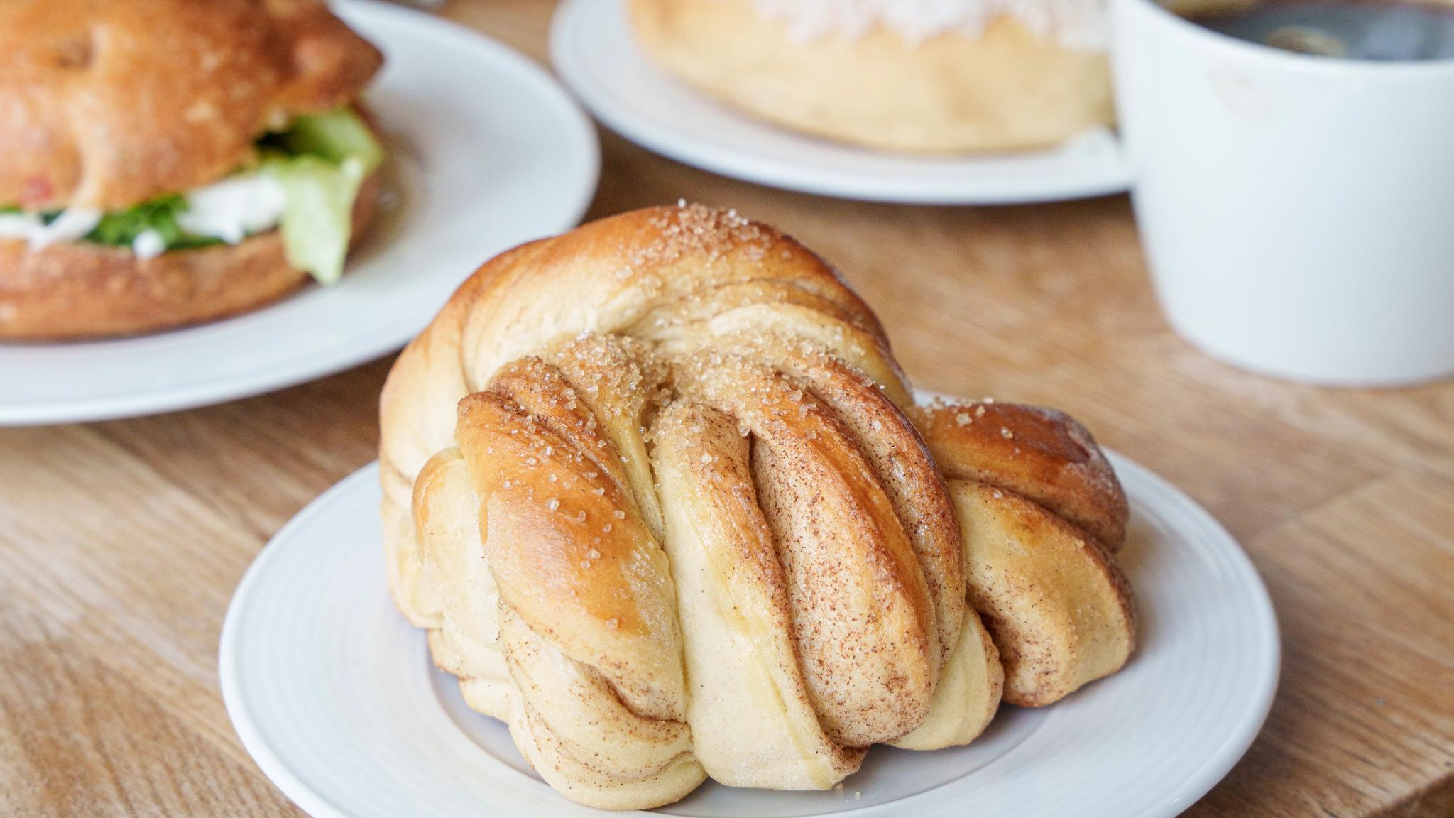 A cinnamon bun on a plate.